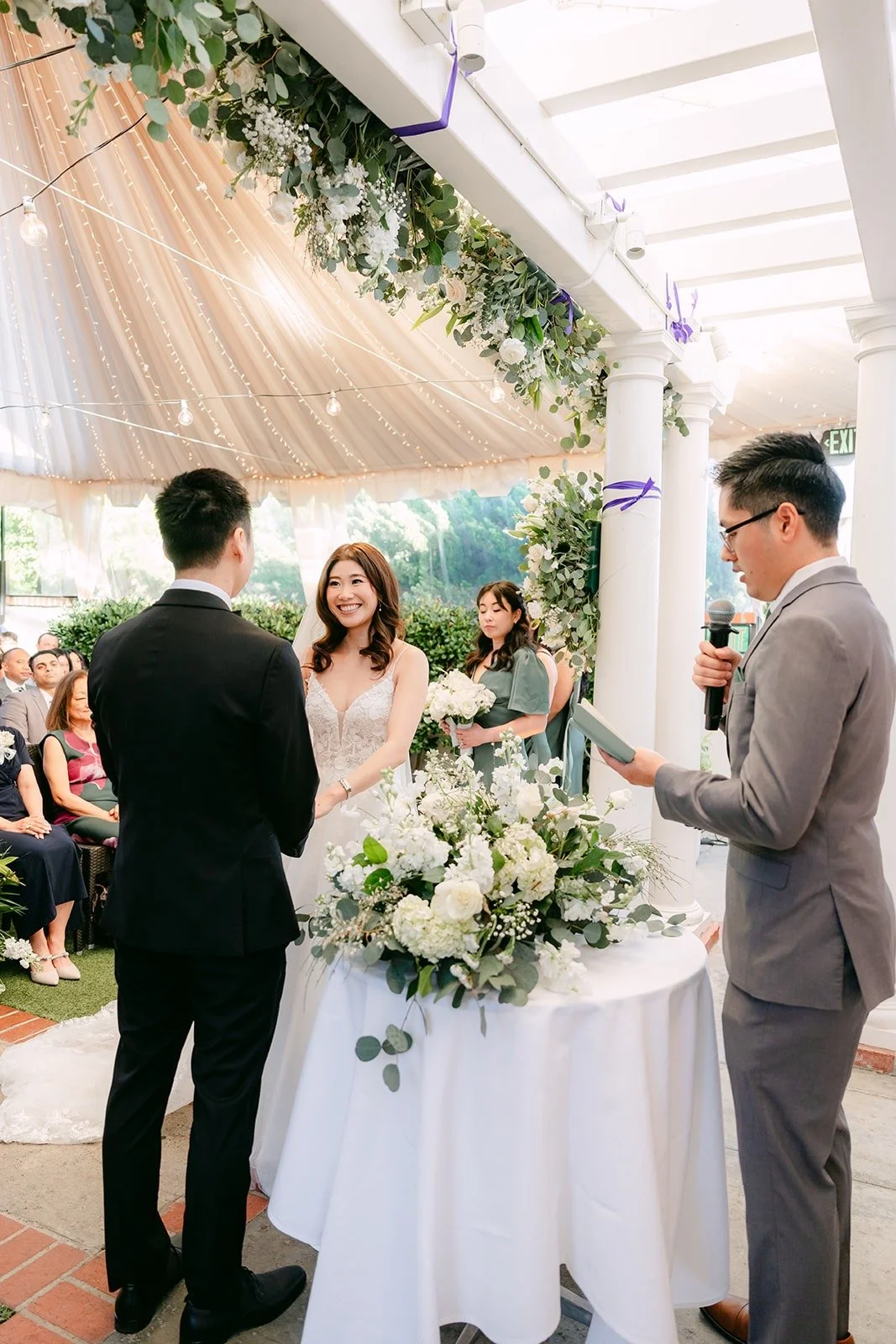 Officiant Justin Wu leading the ceremony at Five Crowns