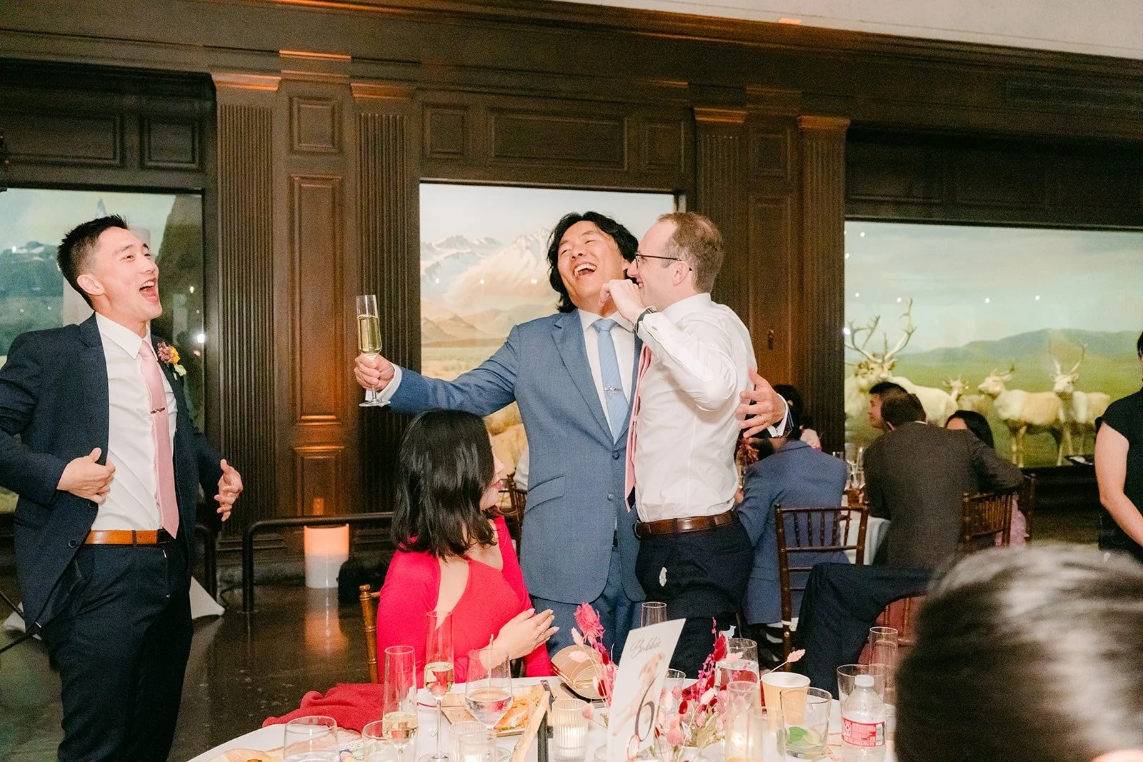 Philip greeting guests at their table