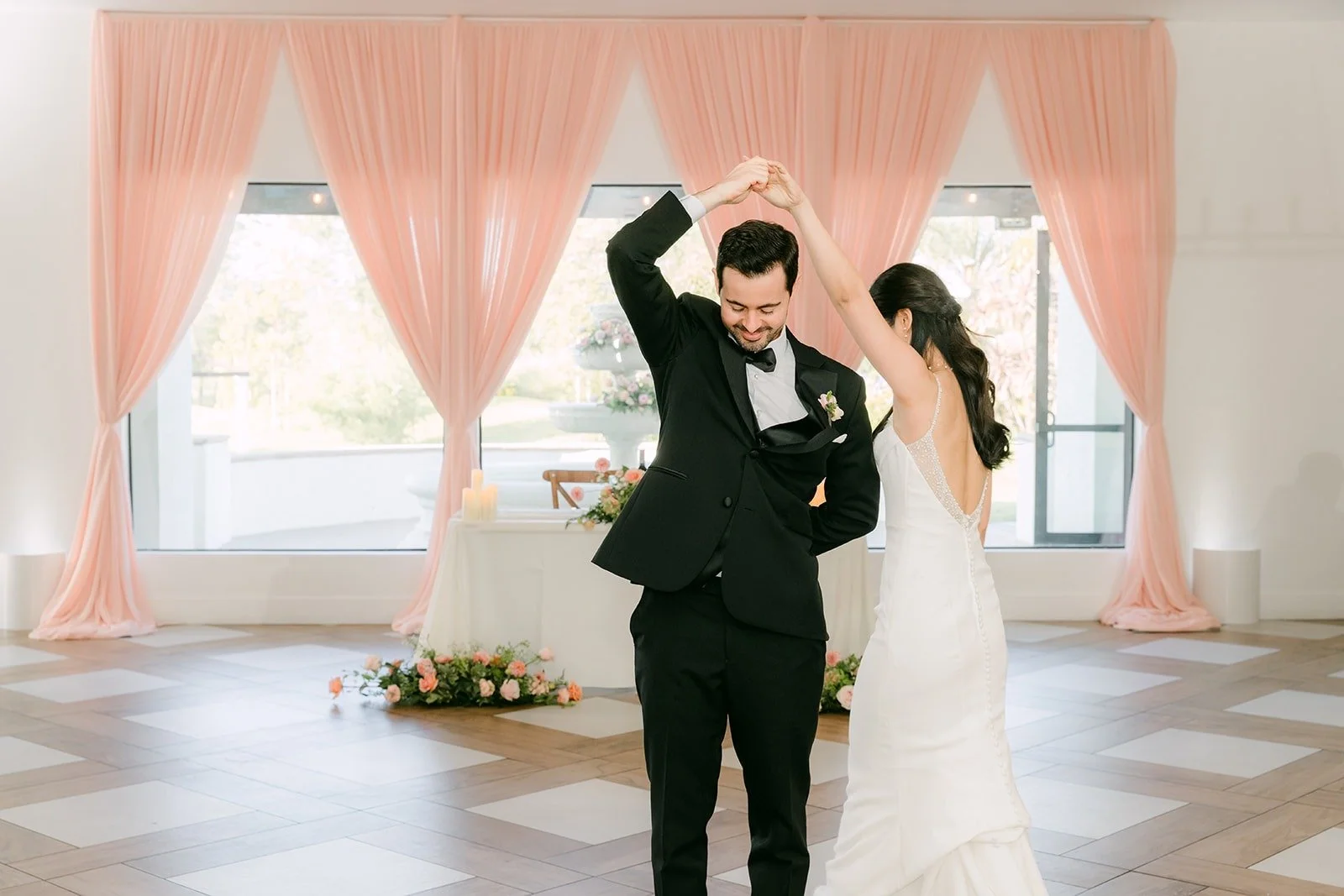 Kevin spinning Stephanie during their first dance