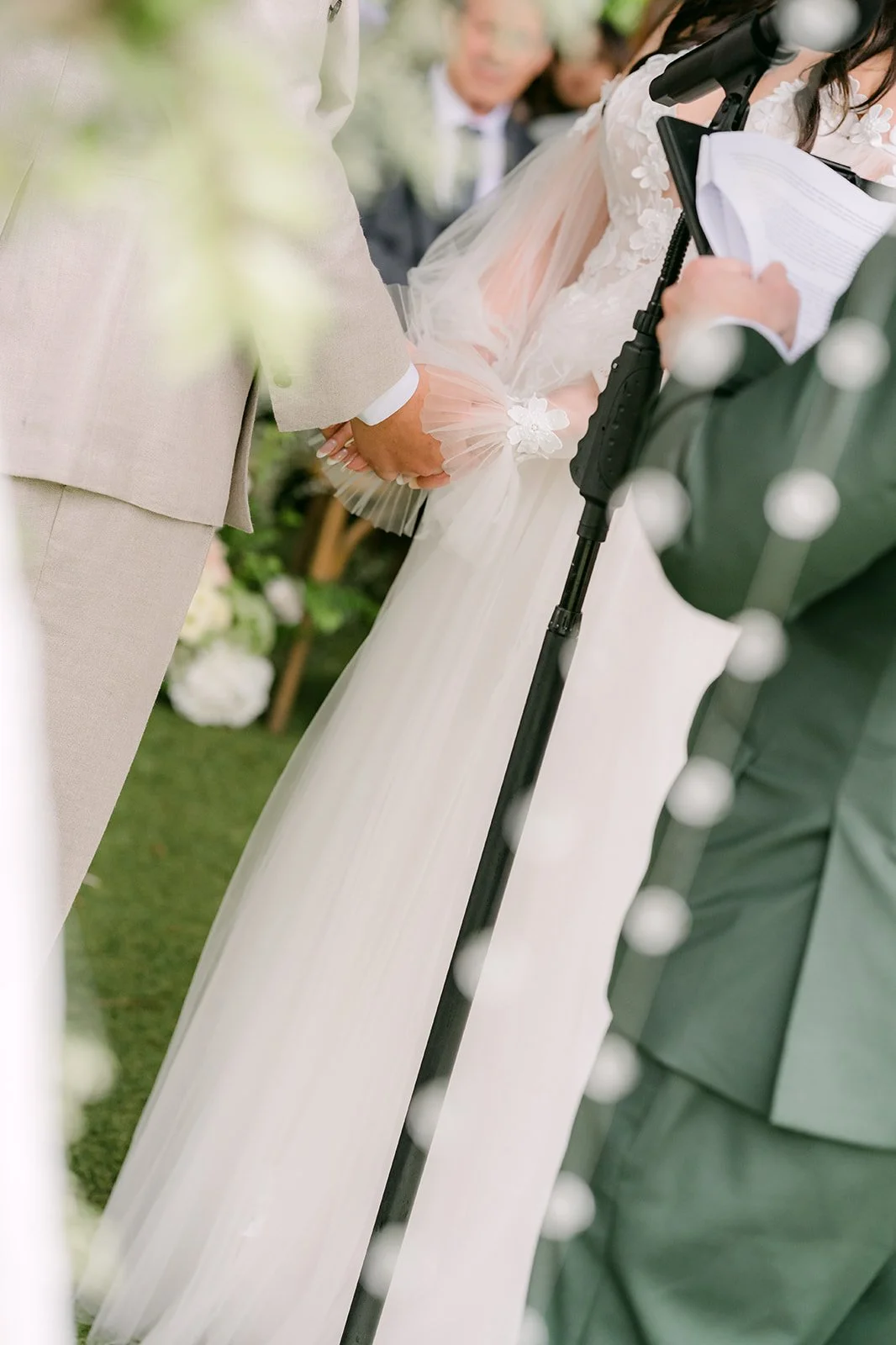 Close up of the couple exchanging rings