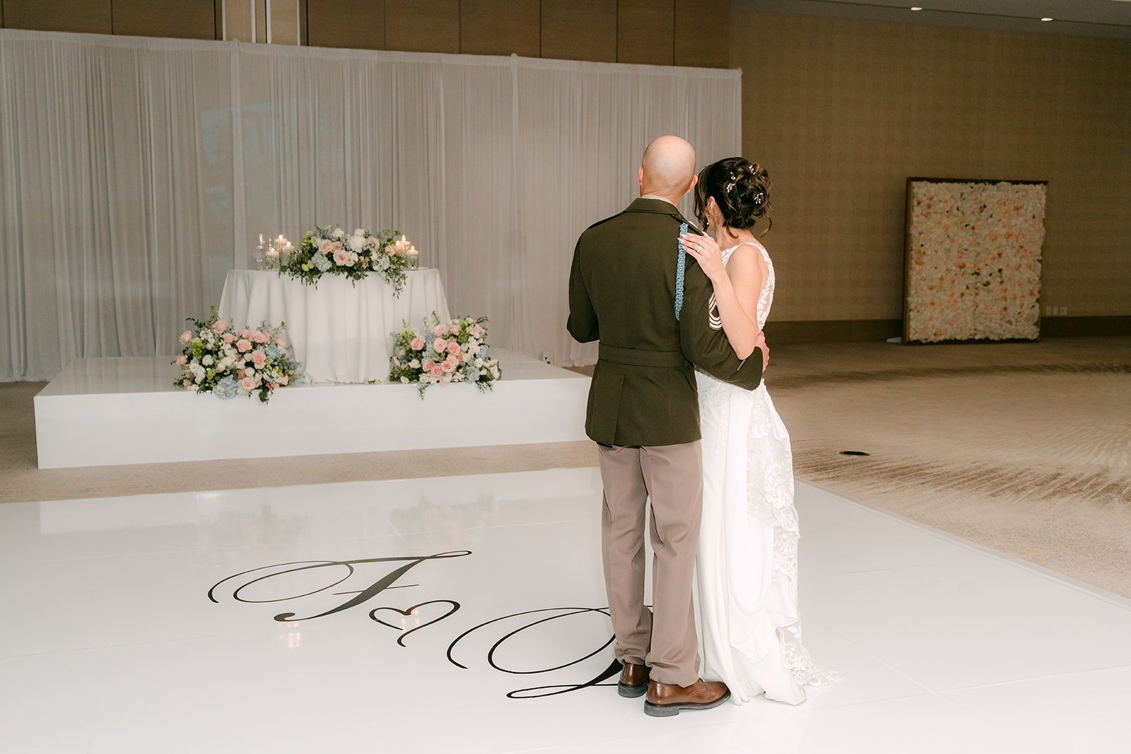 Francesca and Daniel share a private dance on the F and D monogram floor