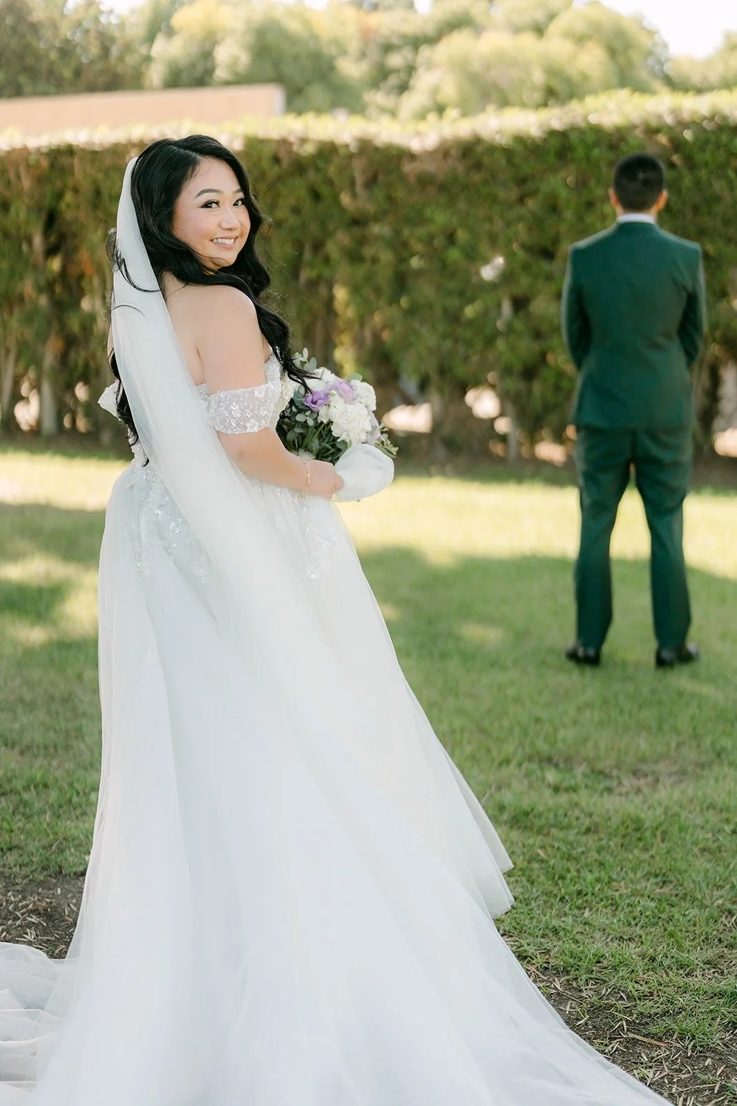 Jennifer walks up behind Kevin for the first look at Garden Grove Park