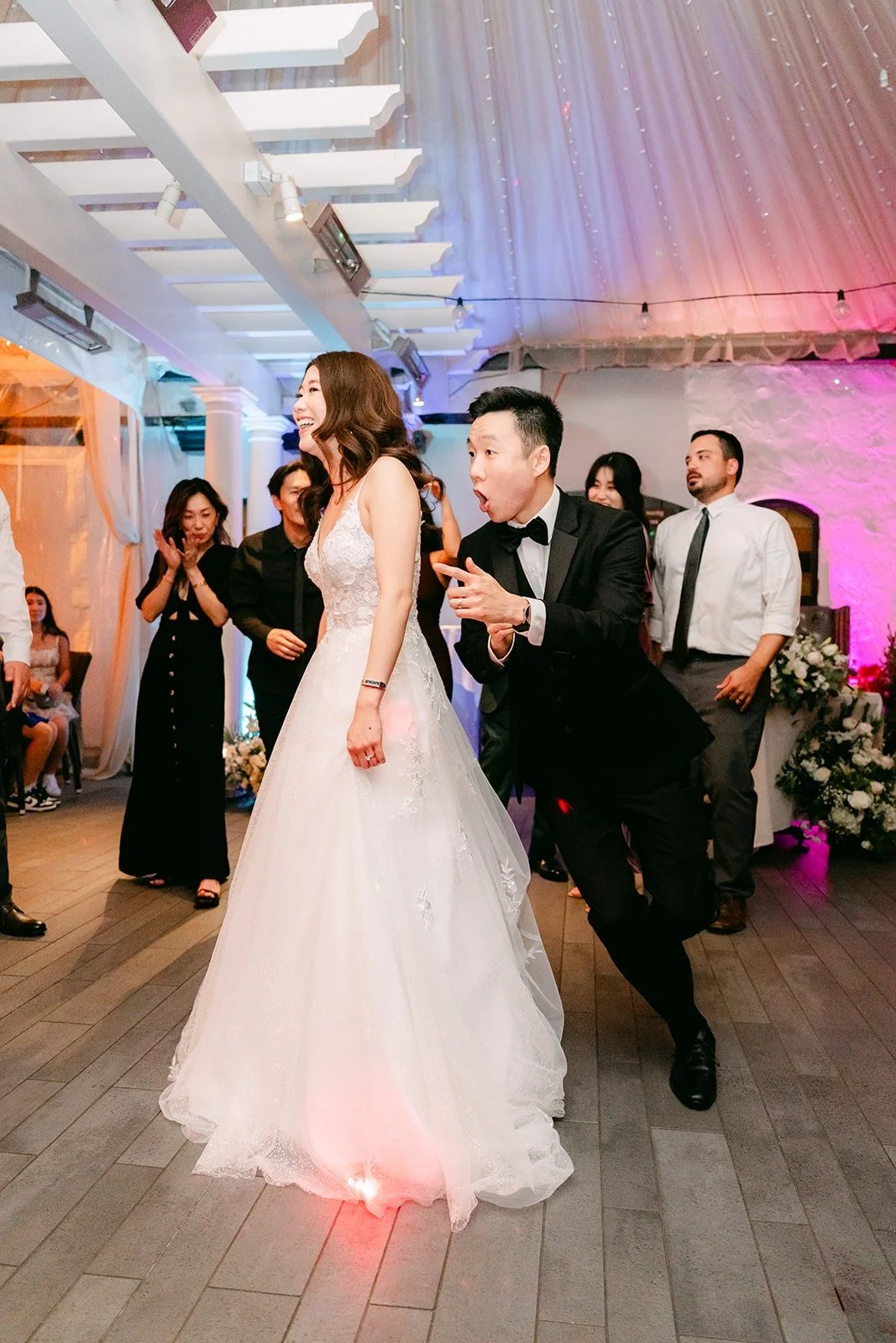 Jason and Valerie dancing together as the party heats up