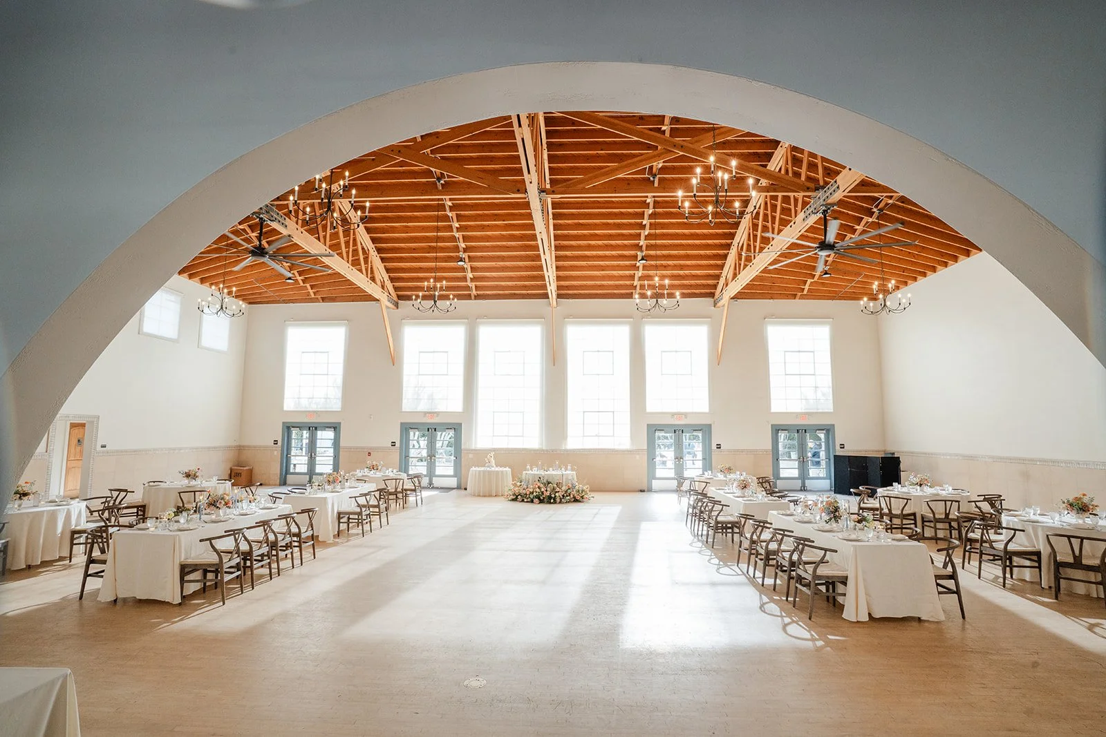 Grand Central reception hall seen through an arch with its timber trusses