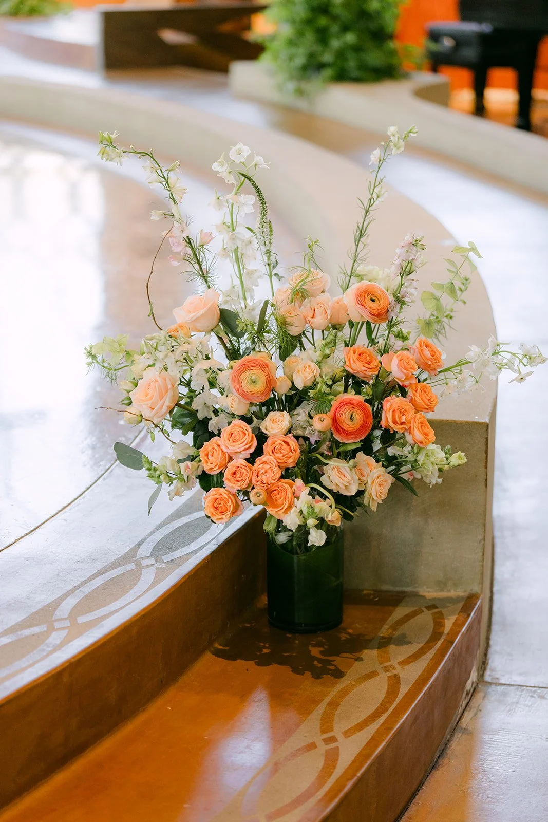 Peach and blush altar florals by Growing Wild