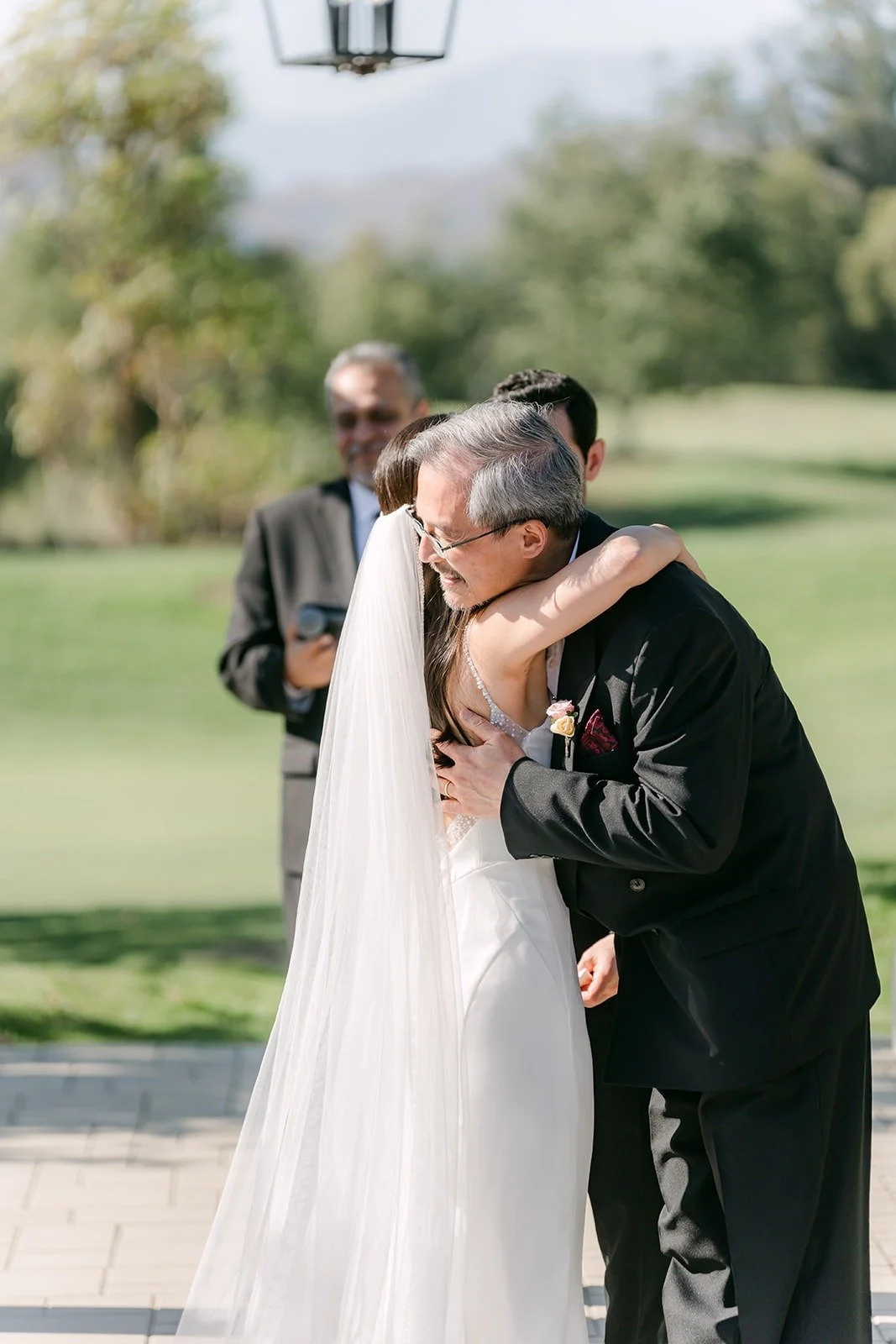 Stephanie hugged at the front of the aisle before she joins Kevin