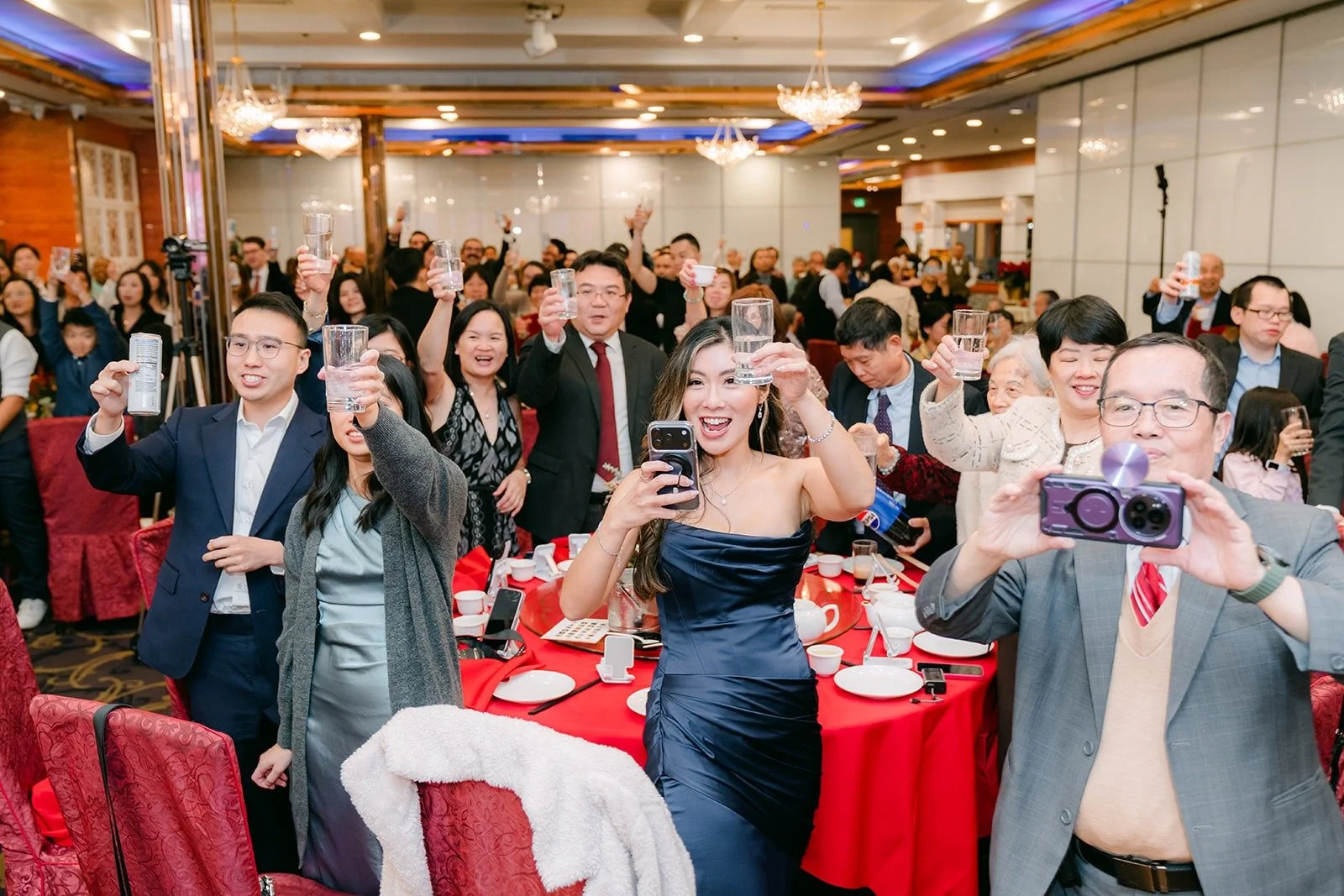 Guests on their feet cheering for the grand entrance