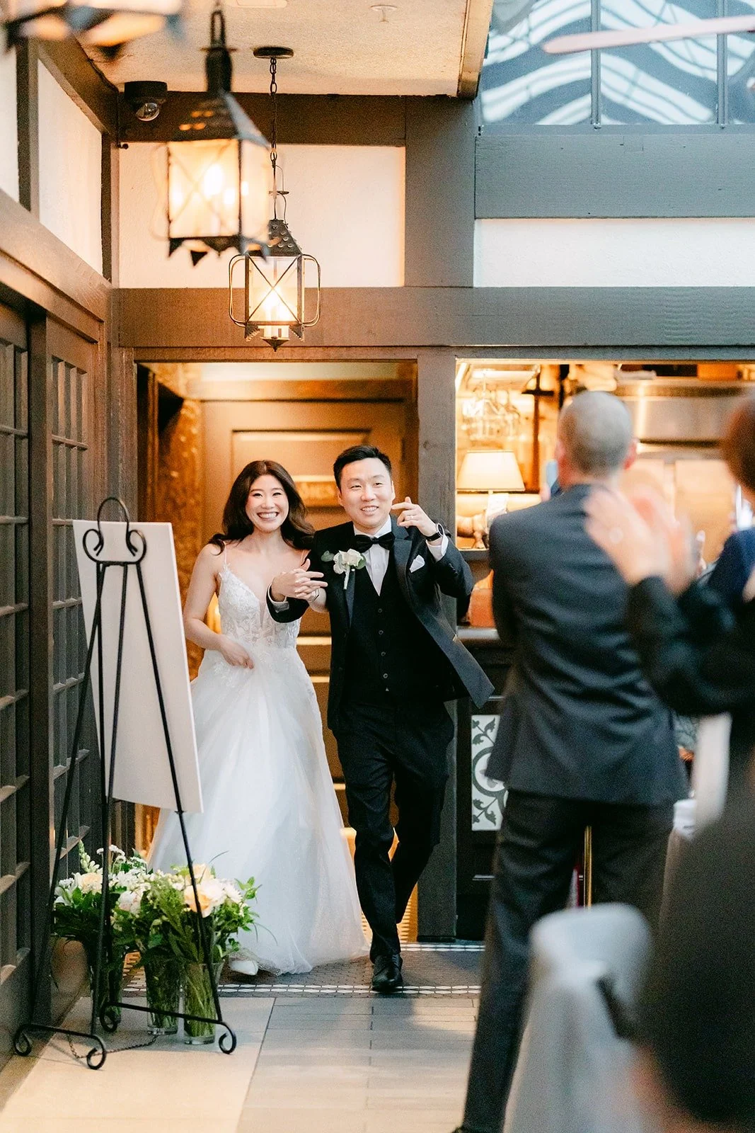 Valerie and Jason making their grand entrance at Five Crowns