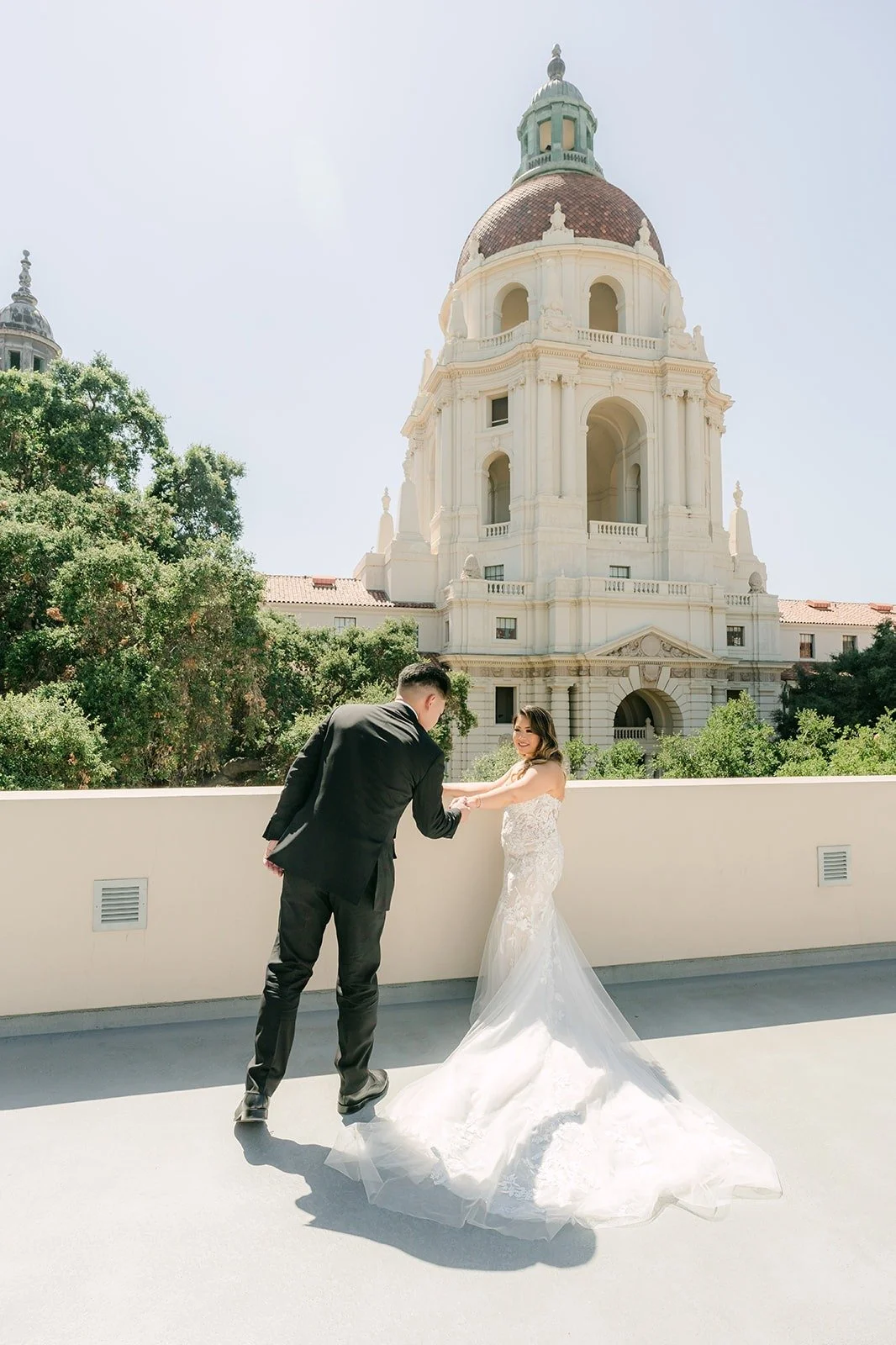 Vincent dipping Candice in front of the Pasadena City Hall dome