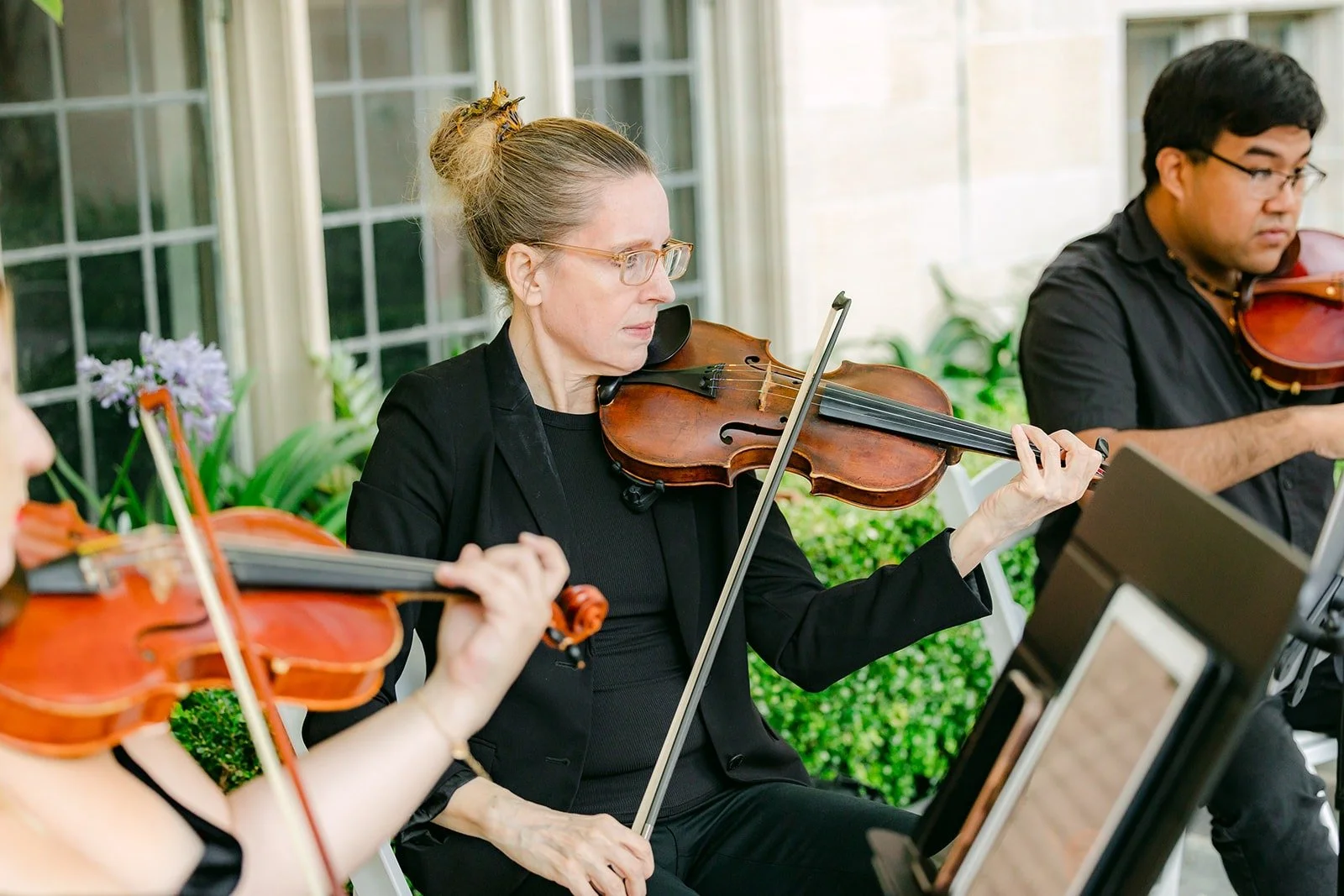 The string quartet performing beside the courtyard