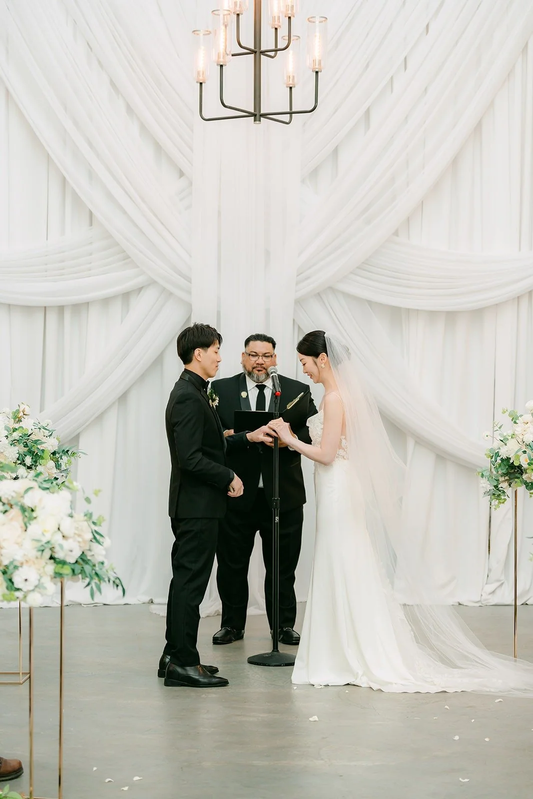 Tin and Fong at the front of the chapel