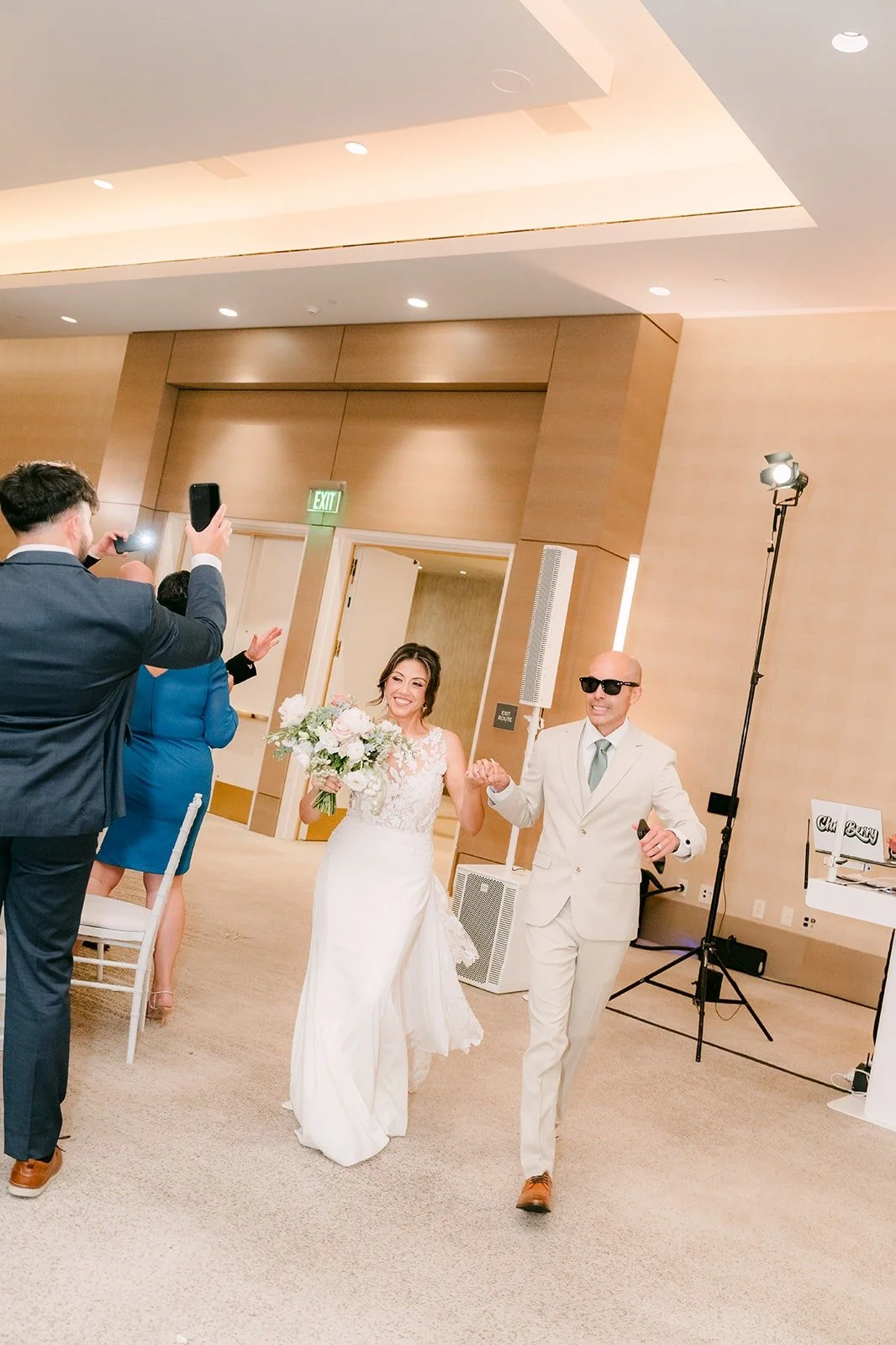 Francesca and Daniel make their grand entrance into the Carousel Ballroom