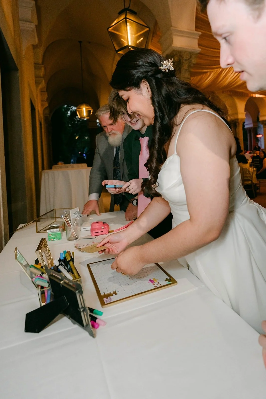 Saira and Matthew adding to the guest book