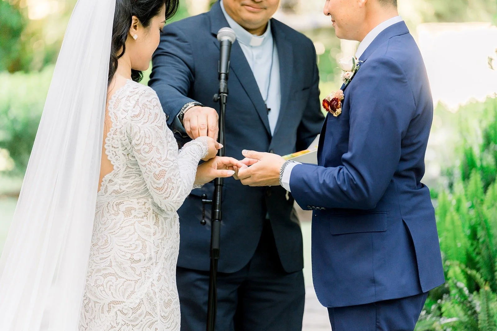 Hannah and Vincent exchanging rings