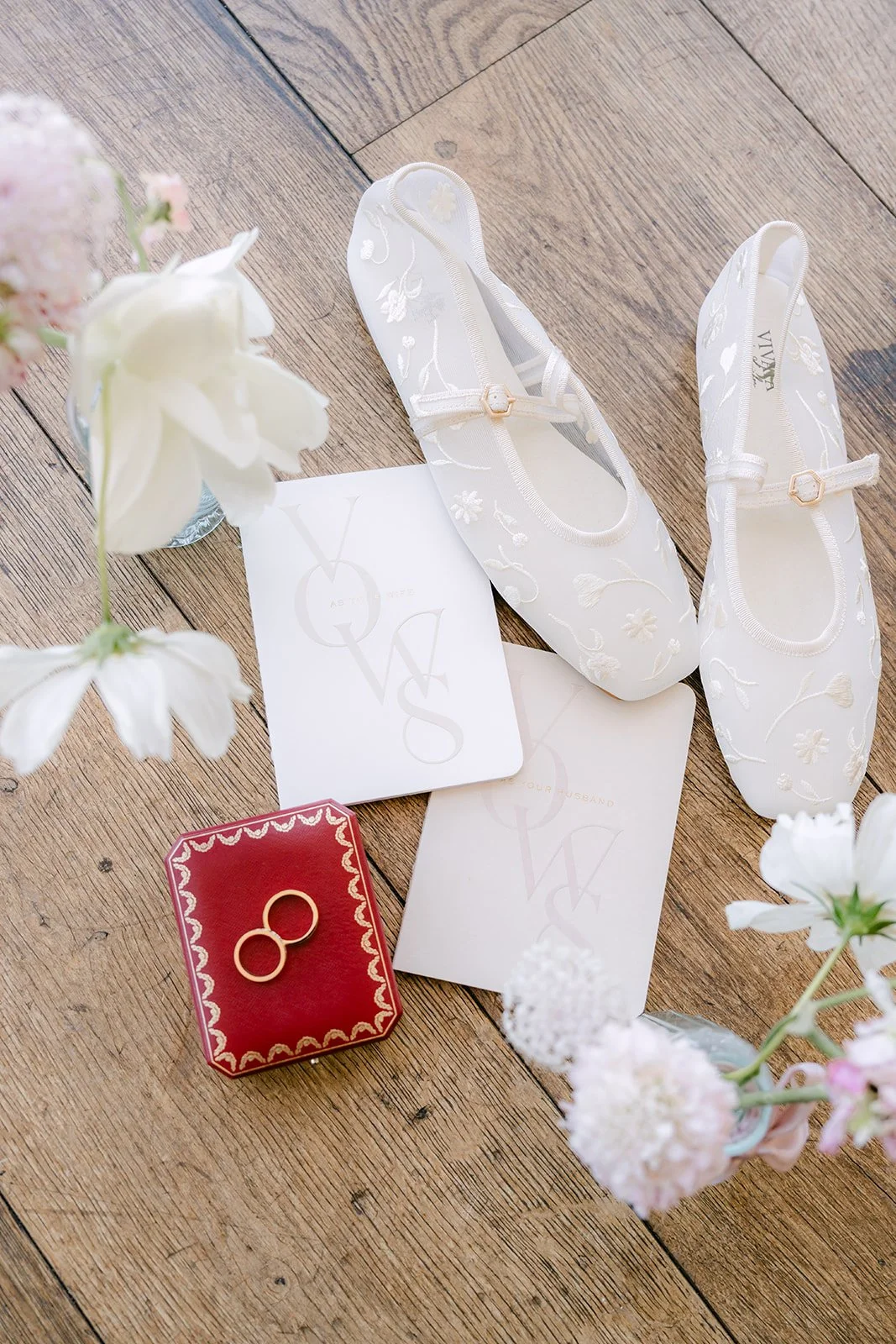 Judy and Joshua's ivory stationery with the ring box and bridal shoes