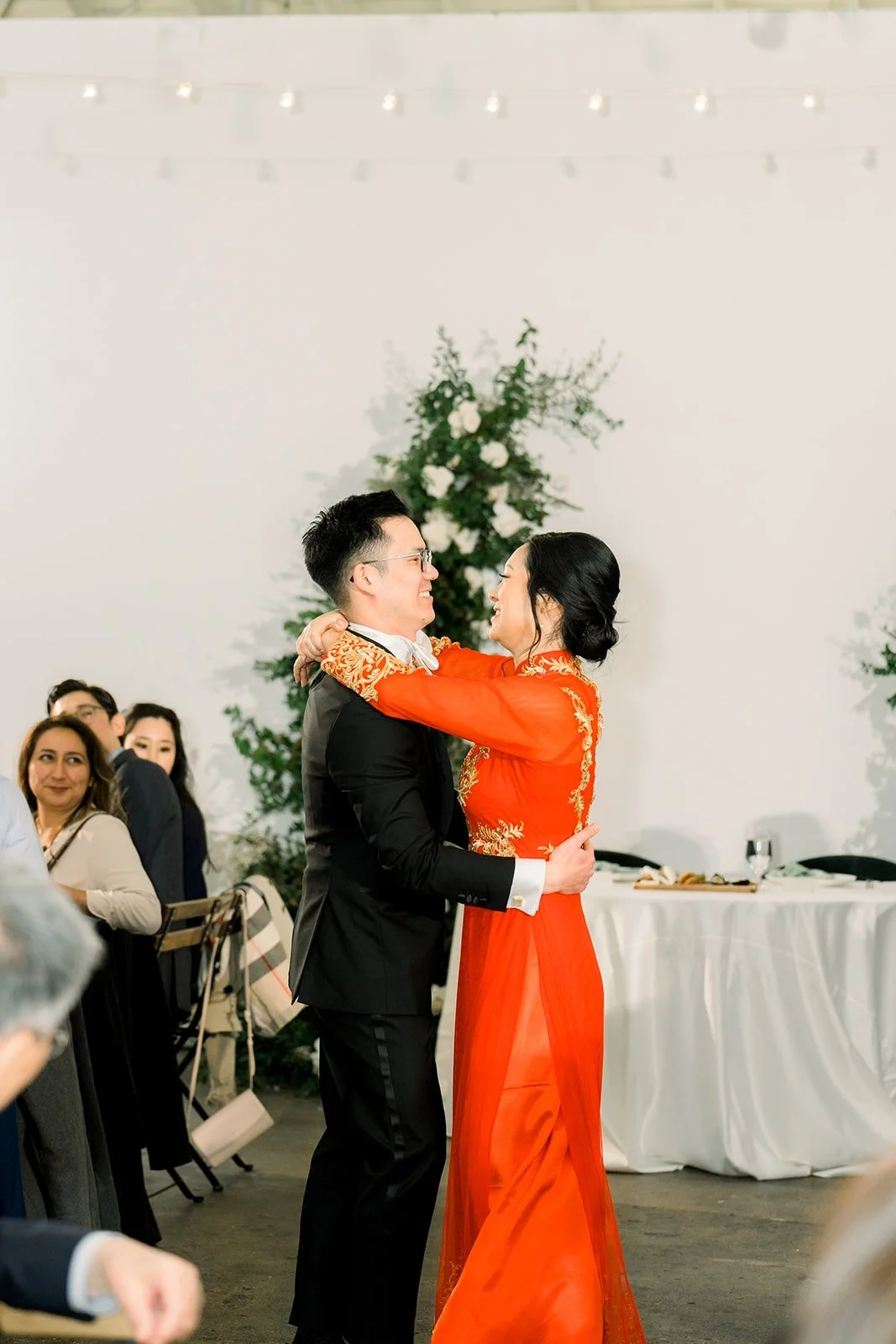 Cindy and Alex dance close