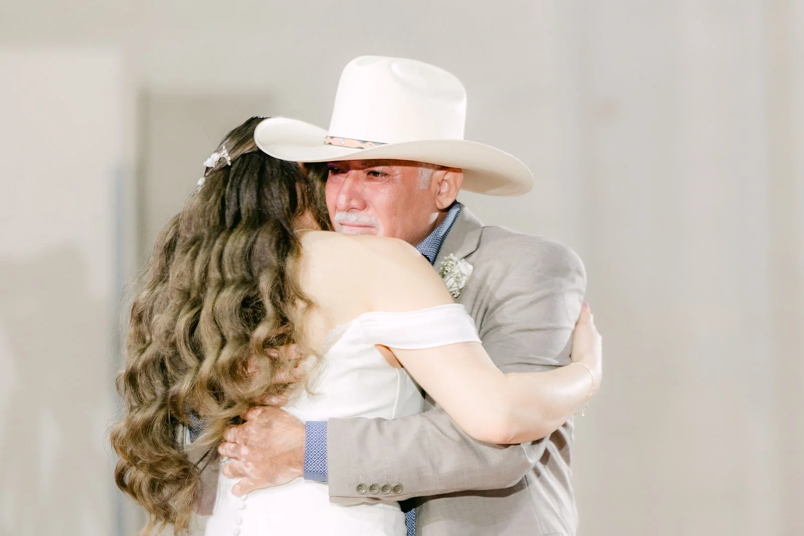 Close up of Mariana hugging her dad