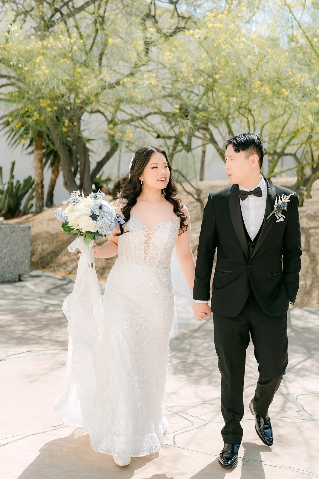 Emily and James walking along the garden path