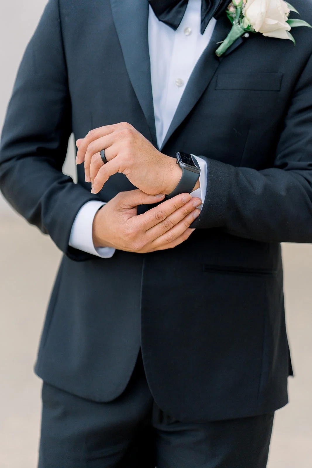 Ralph fastening his cufflinks, photographed by One and Only Production