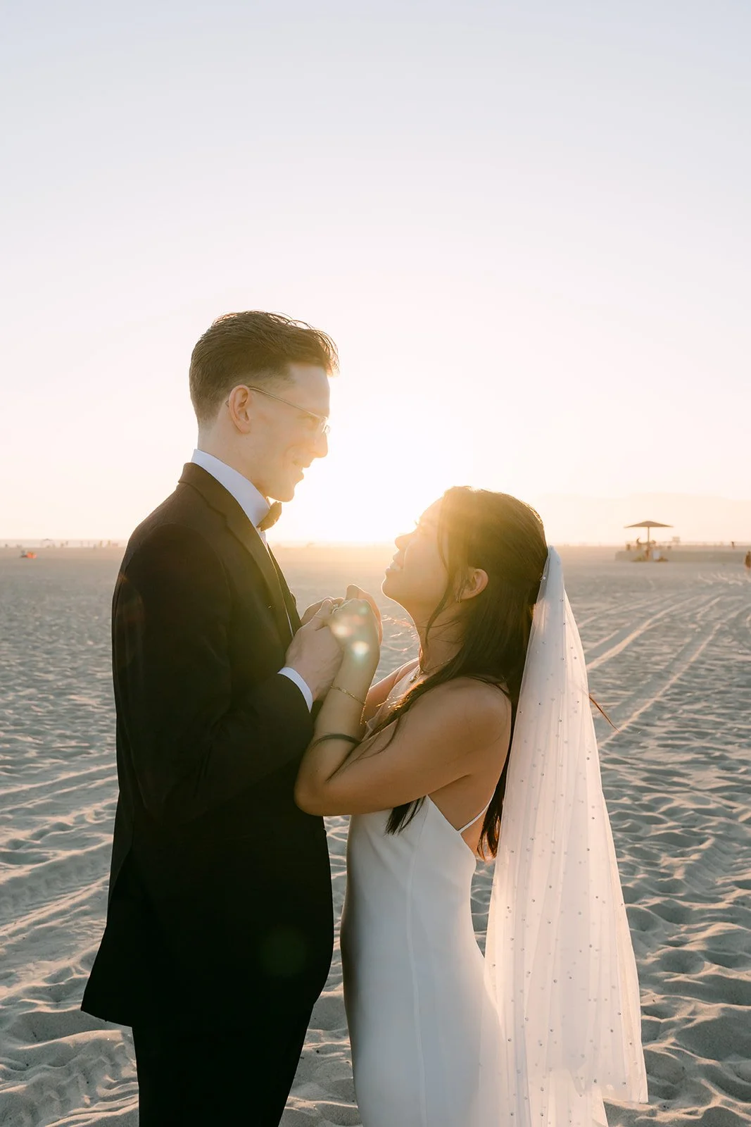 Forehead to forehead at golden hour on Venice Beach