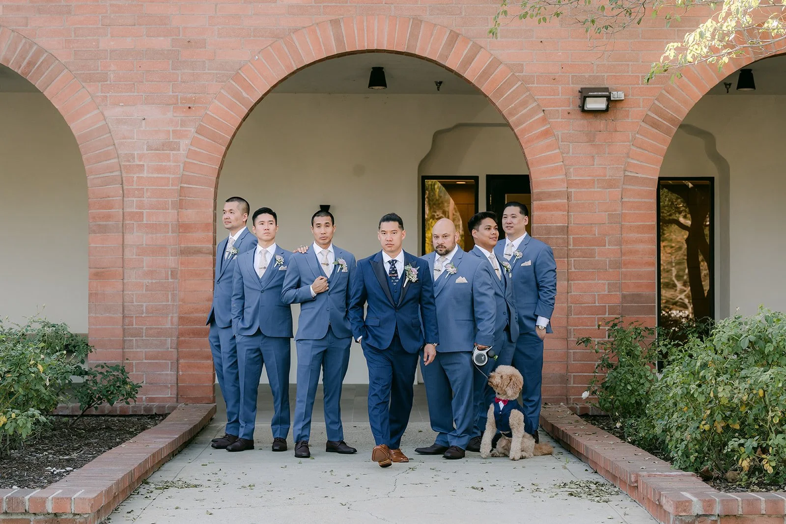 Michael and his groomsmen lined up in the courtyard.