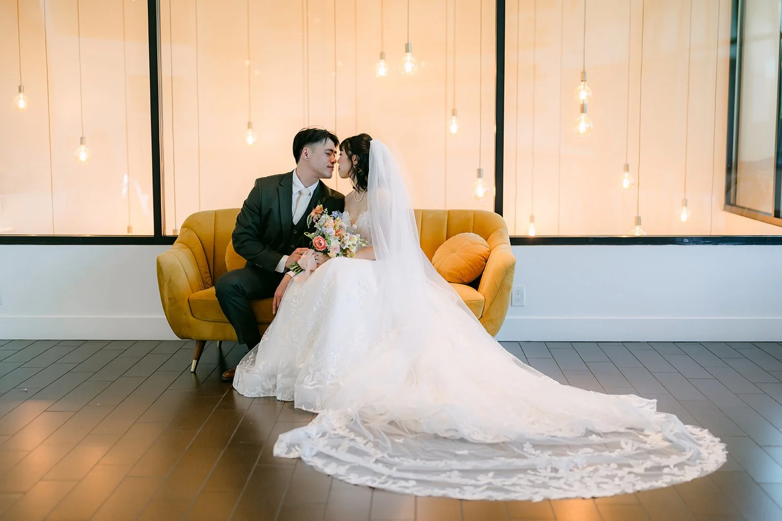Wide portrait on the mustard sofa with the cathedral train spread out
