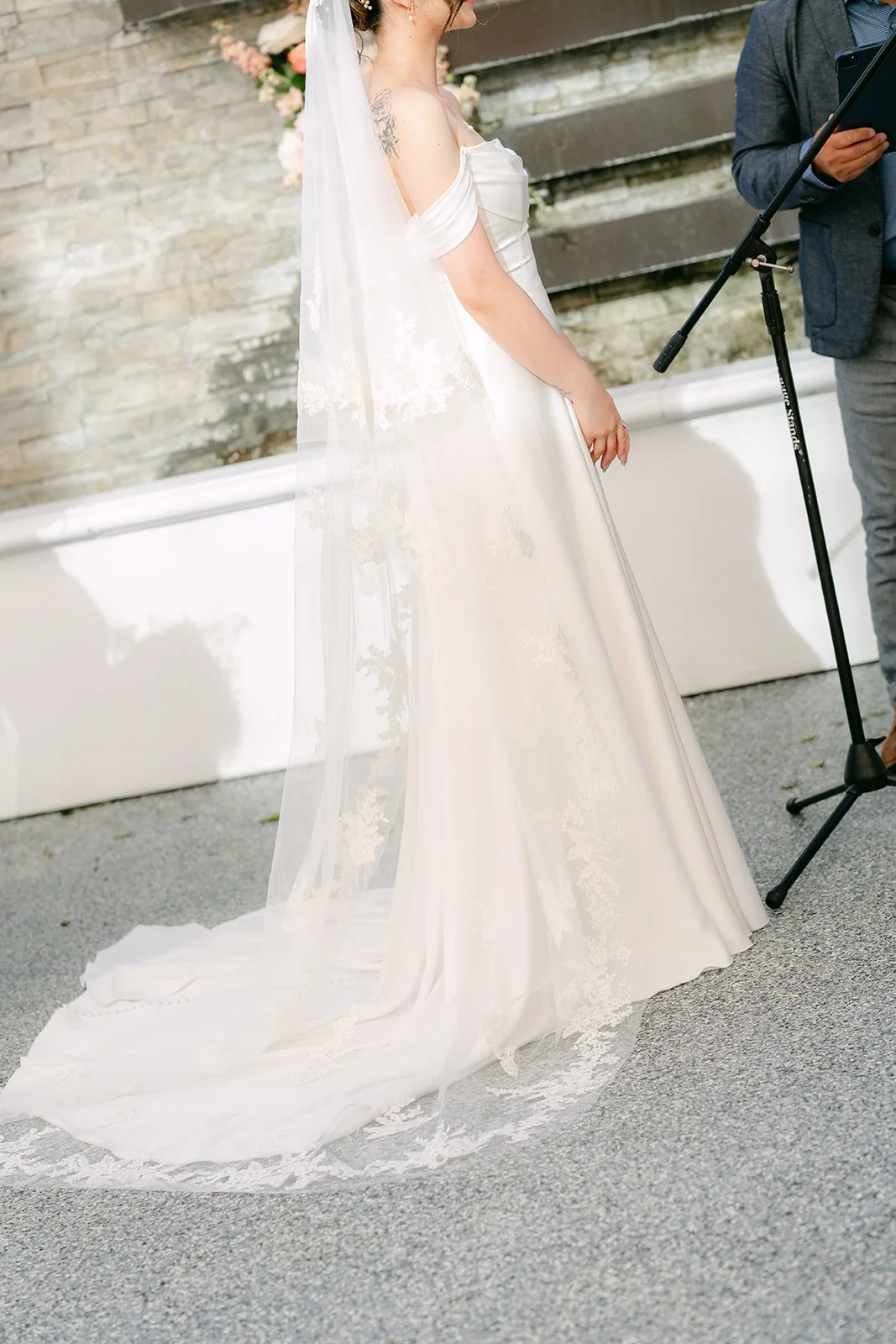 Amanda's veil and train as she stands at the front of the ceremony.
