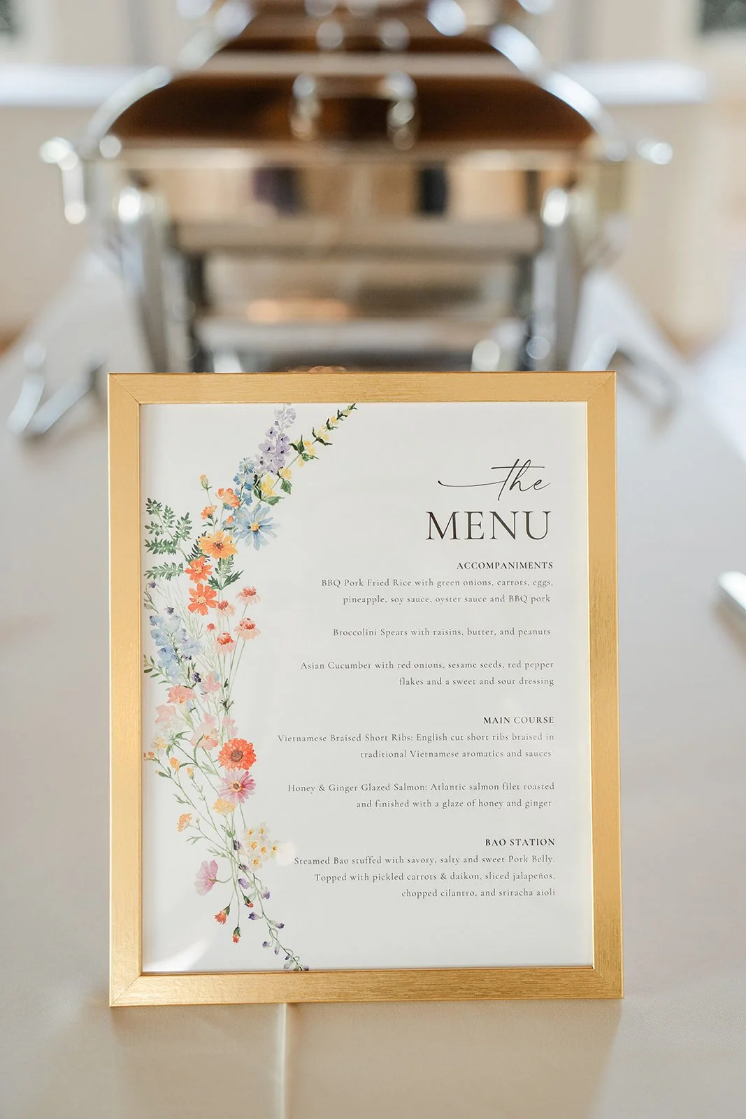 Wedding menu sign in a gold frame