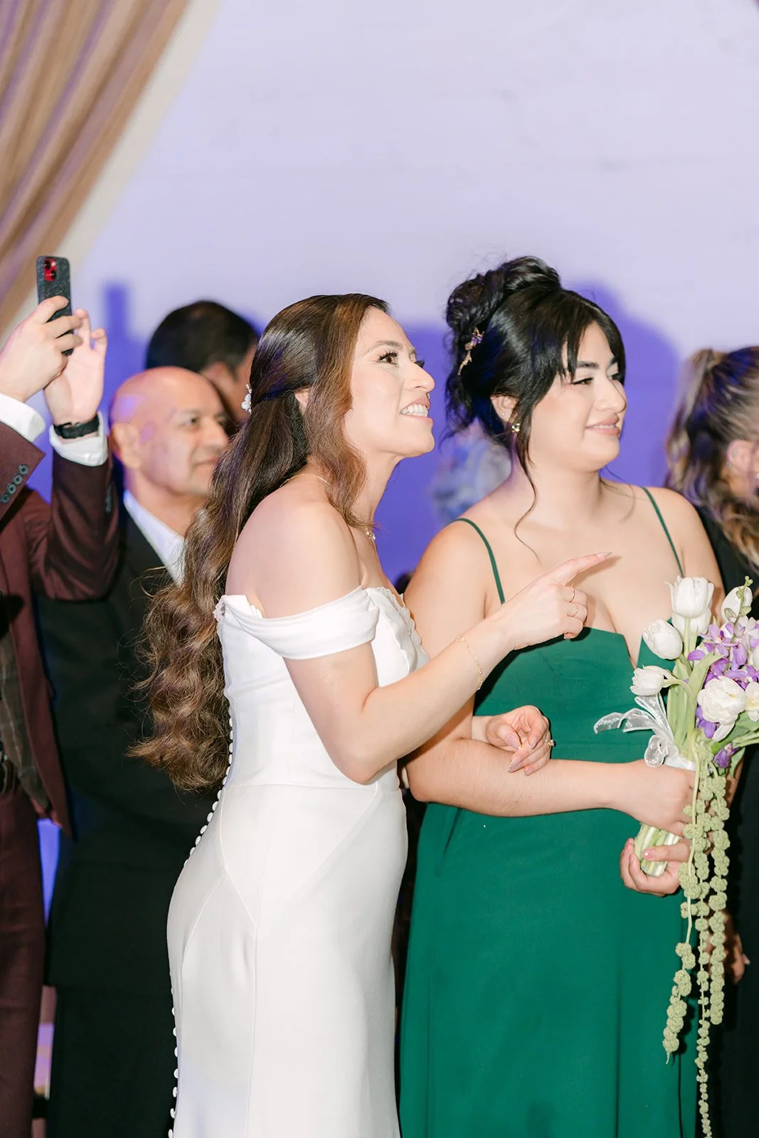 Mariana with a bridesmaid during the parent dances