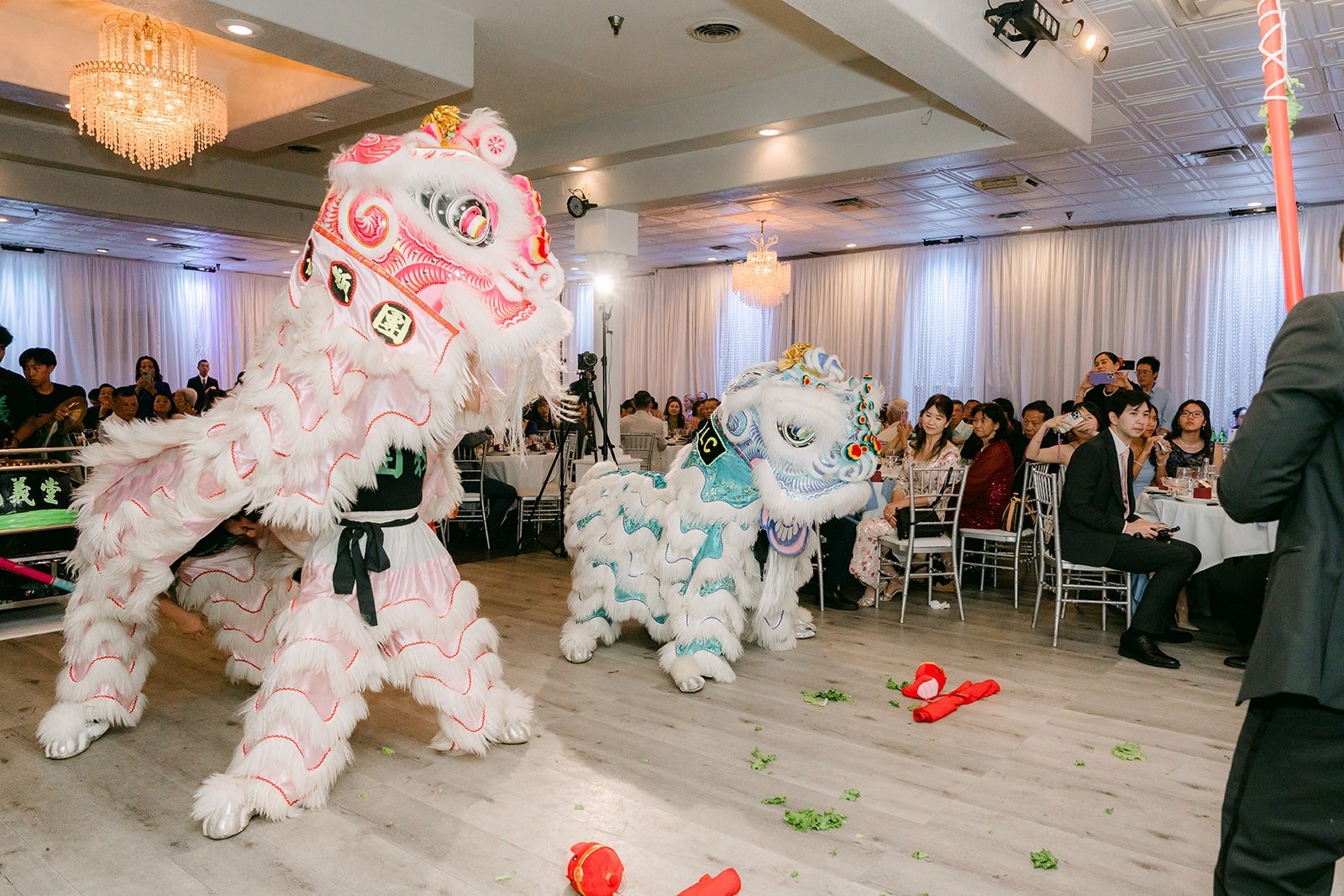 Lions dancing between the tables