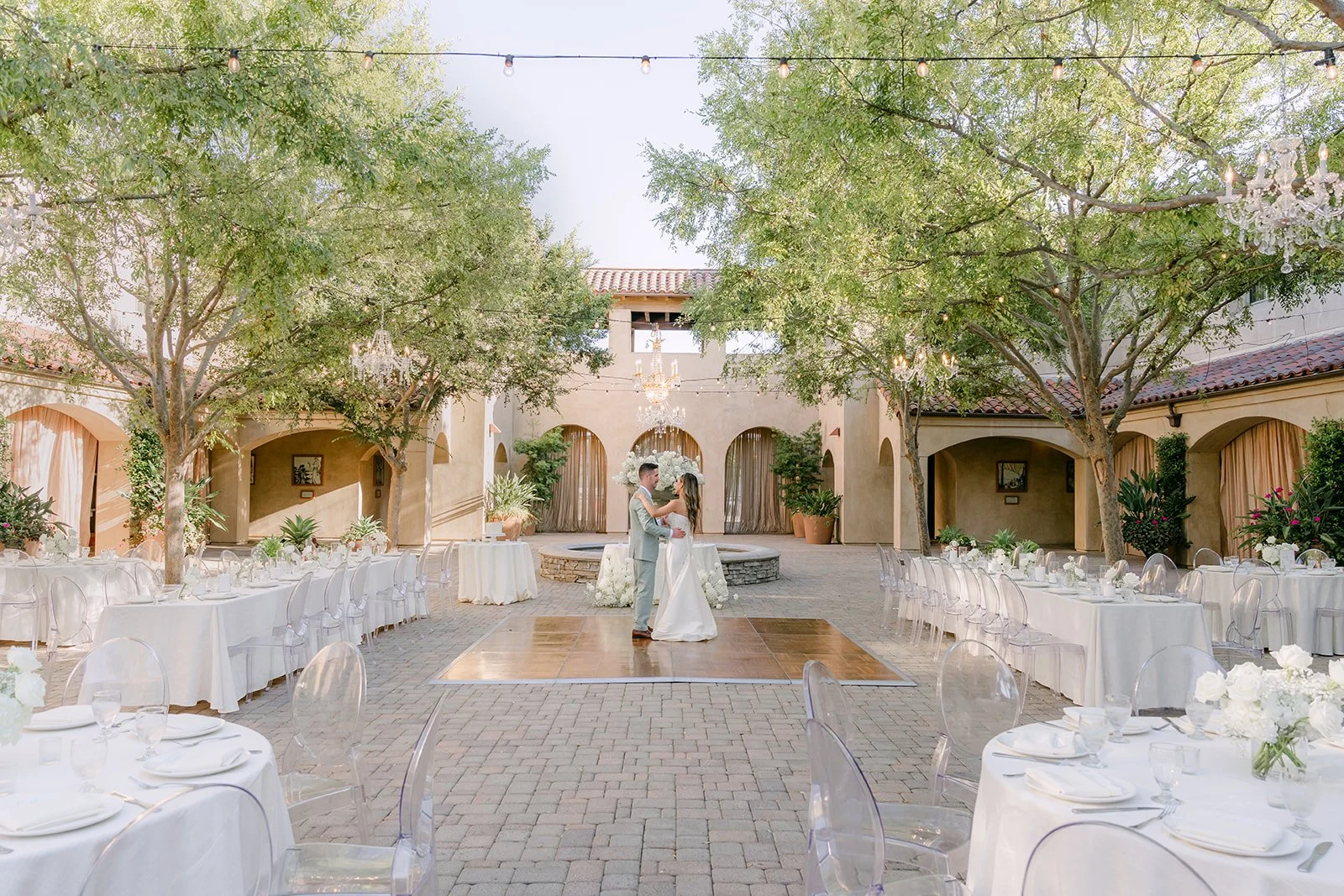 Wide view of the Serra Plaza courtyard reception with the dance floor ready