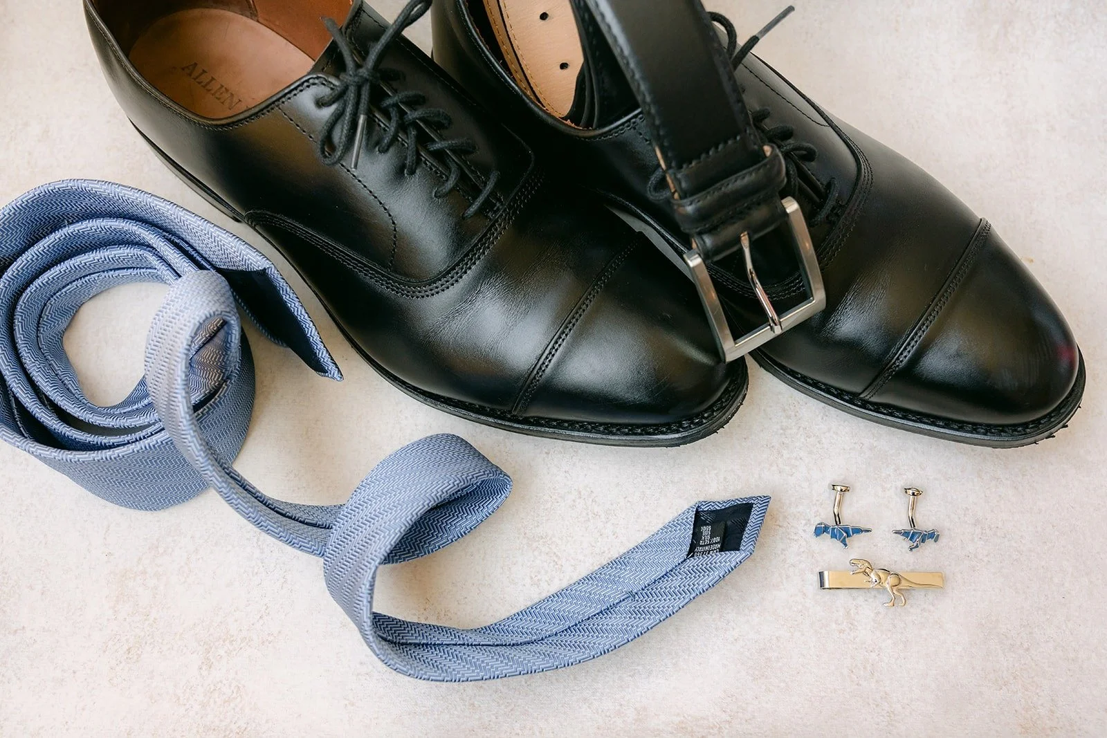Philip's shoes and tie with silver cufflinks, photographed by One and Only Production
