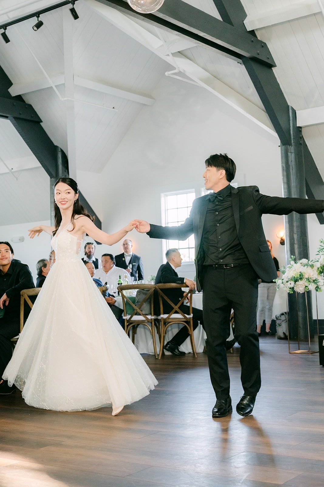 Fong spinning Tin during their first dance