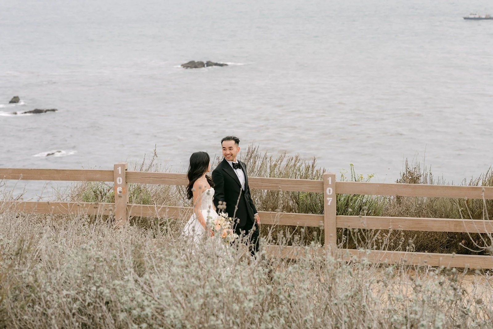 Kim and Vincent small against the Pacific at Point Vicente