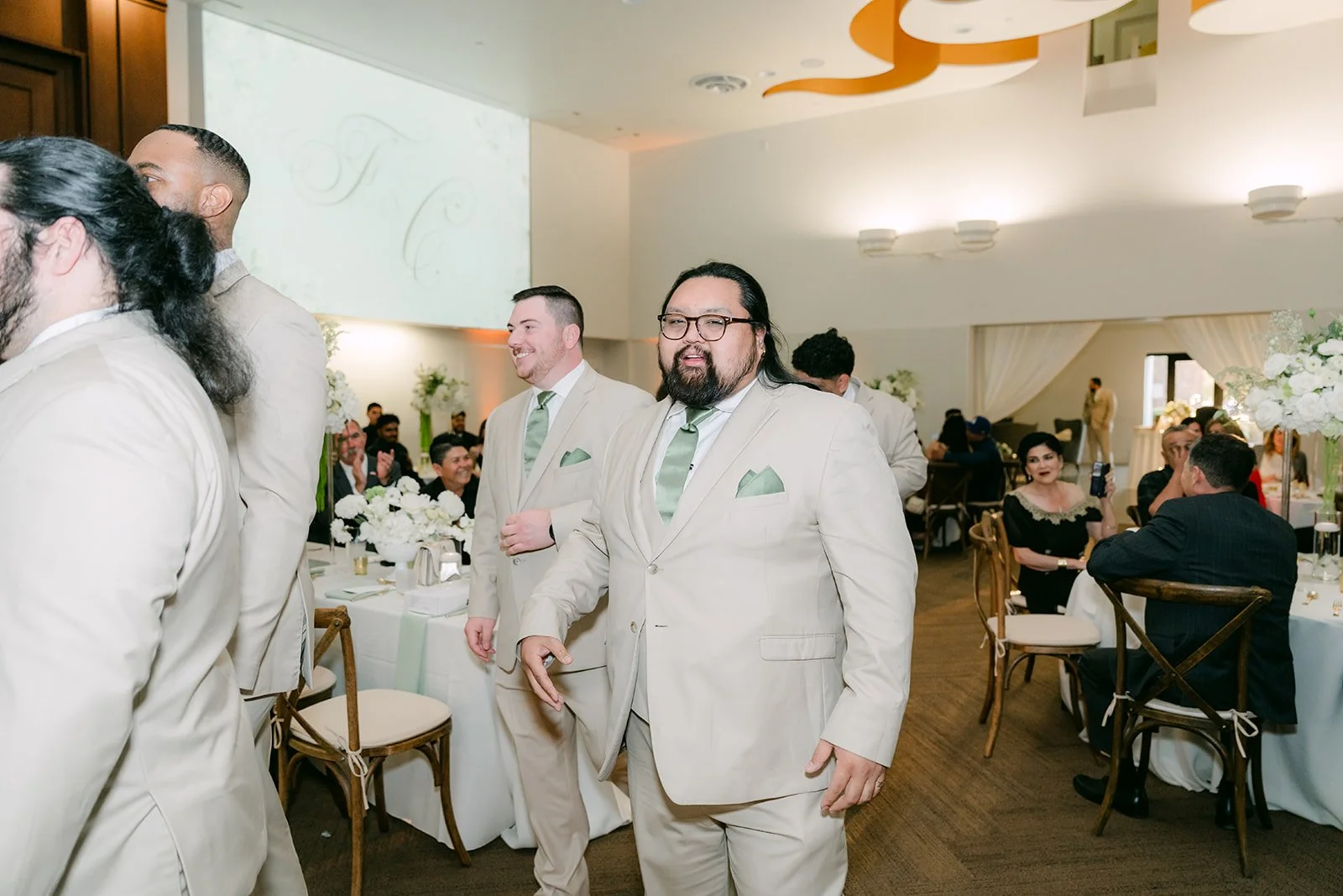 The groomsmen making their entrance.