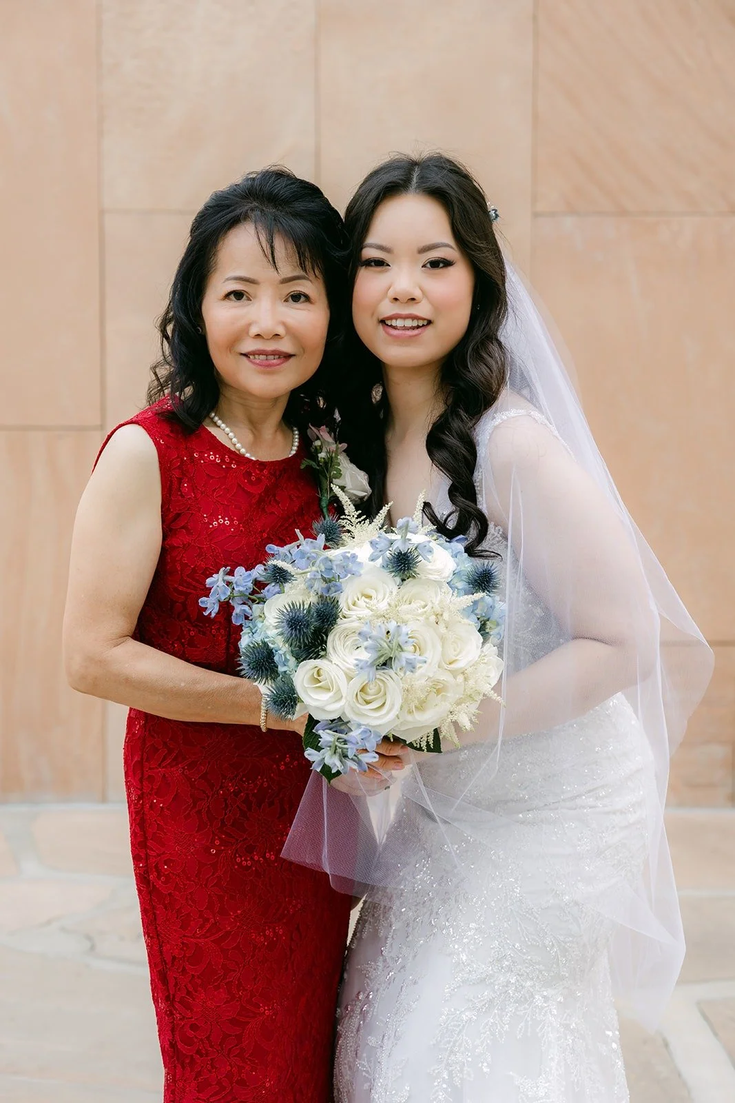 Emily with a family member in red