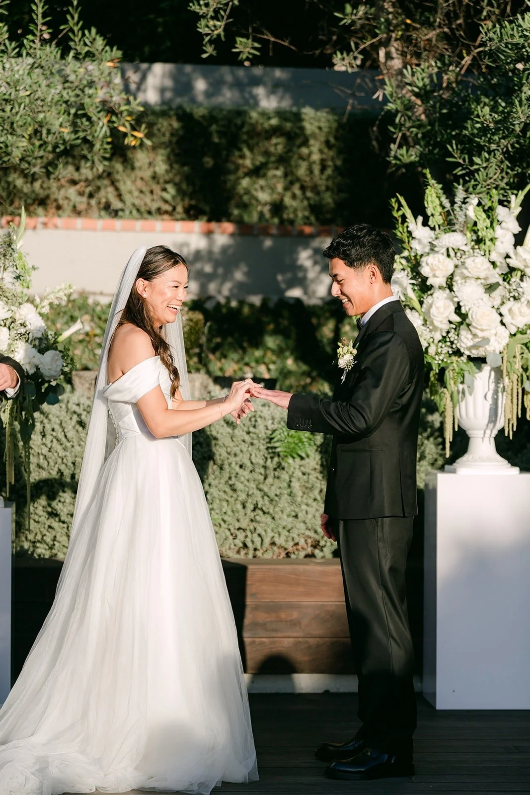 Jadee placing the ring on Richard's finger