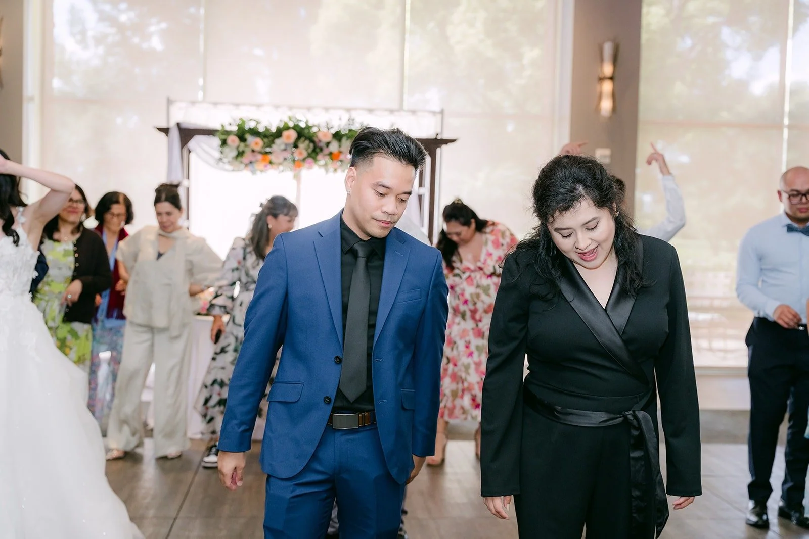 Mark dancing with a guest at the end of the party, photographed by One and Only Production
