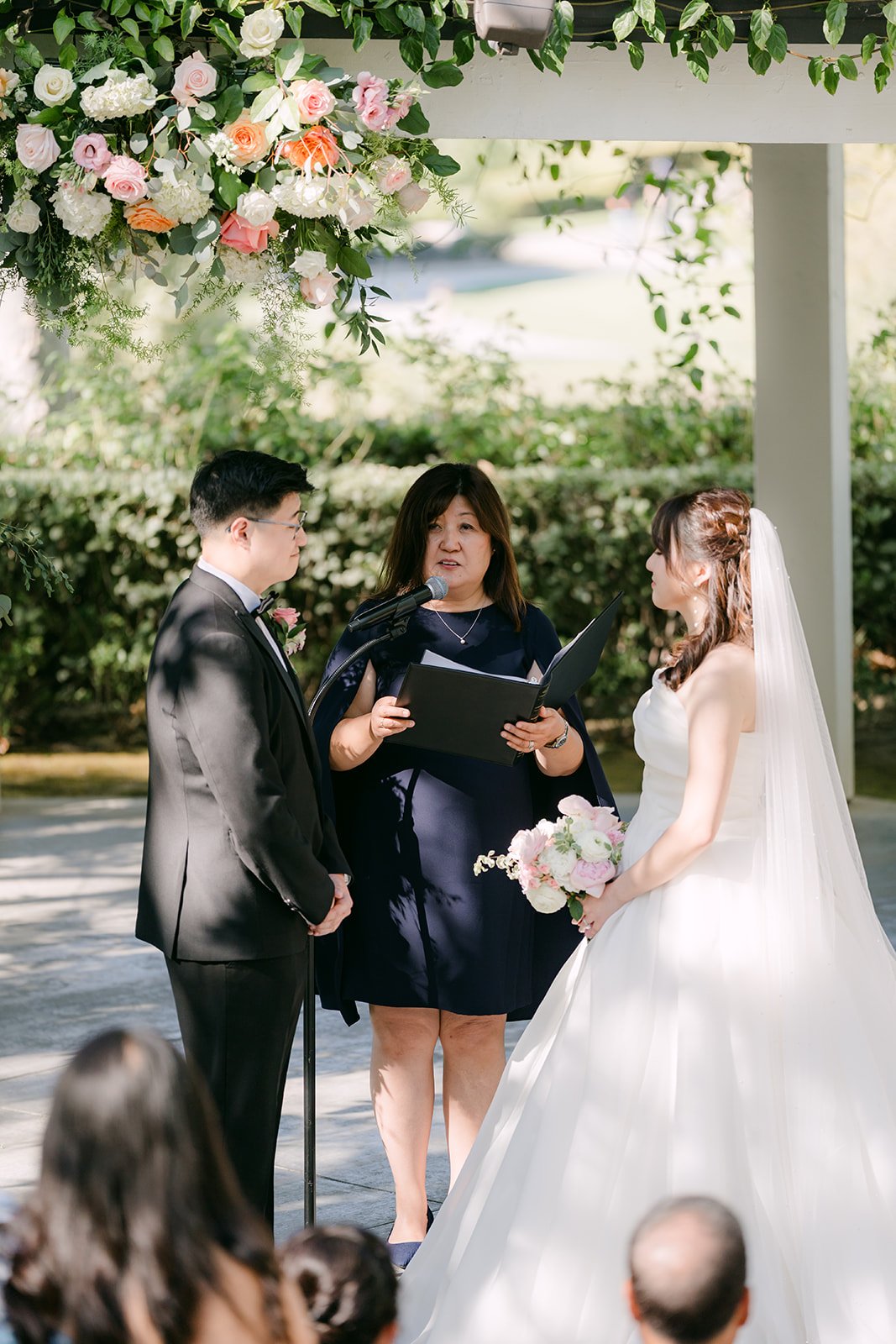 Joshua's aunt officiating the ceremony