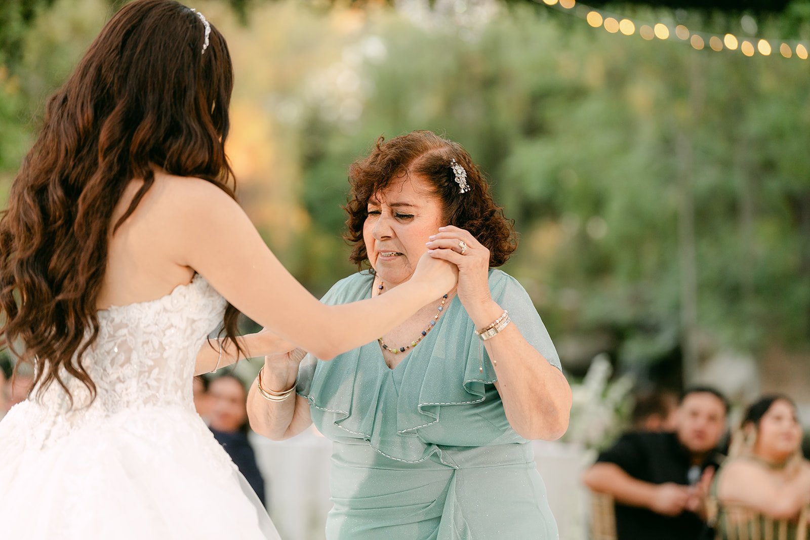 Sandra's grandmother tearing up as they dance.