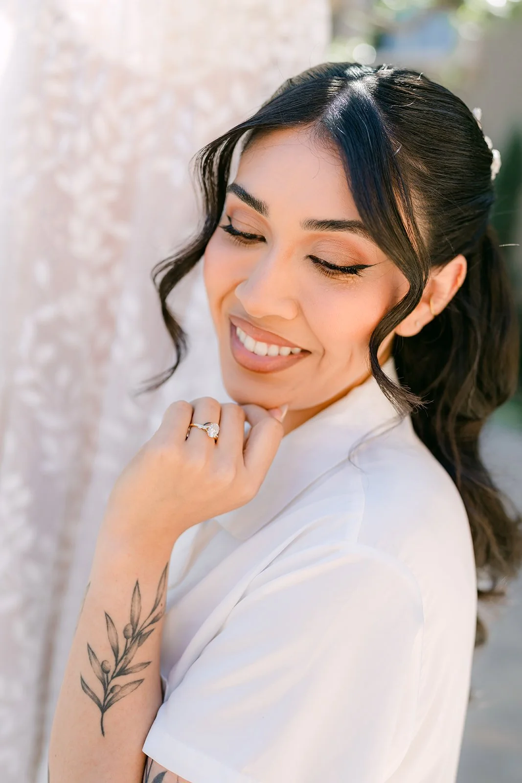 Fernanda smiling in her robe before getting dressed.