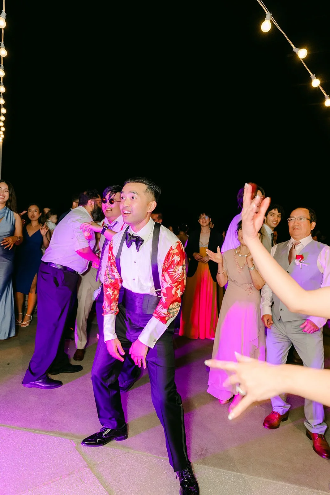Vincent dancing under the purple lights