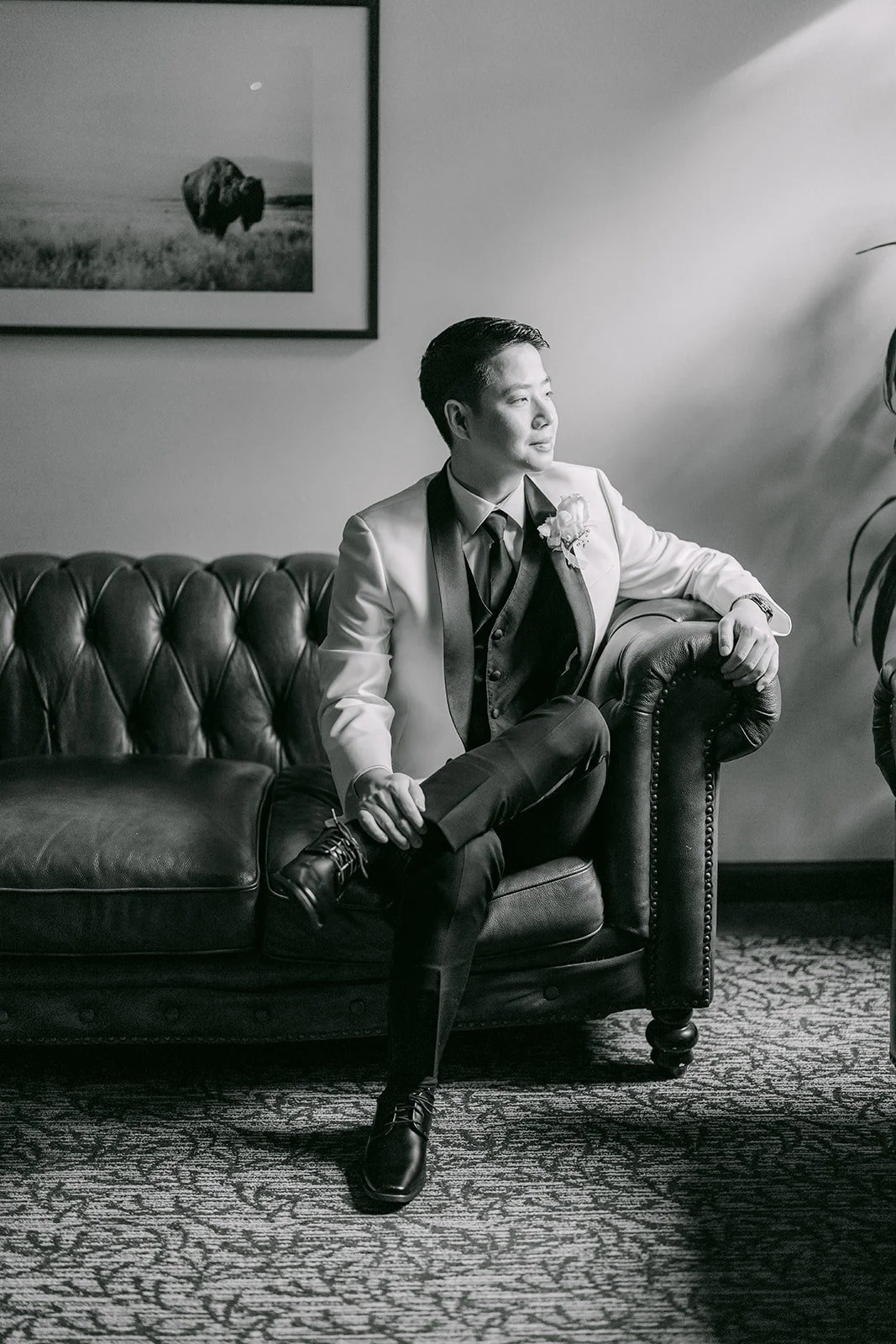 Black and white of Chungman on the leather sofa