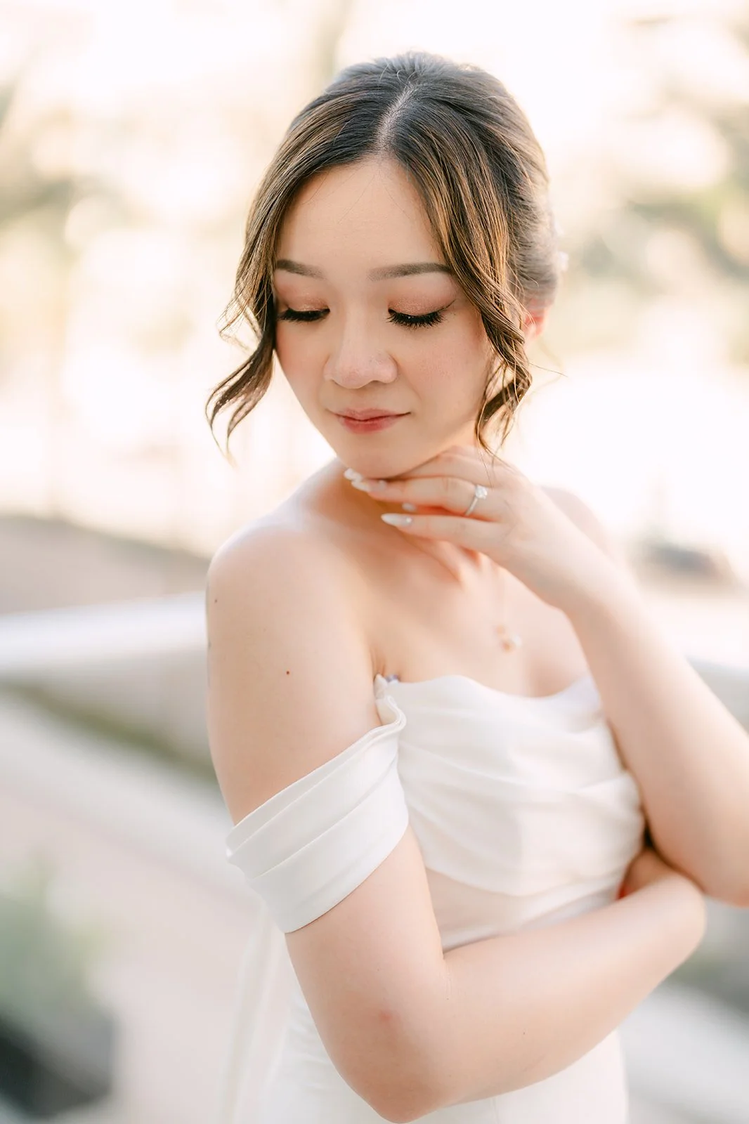 Close portrait of Amanda in her off-the-shoulder gown.