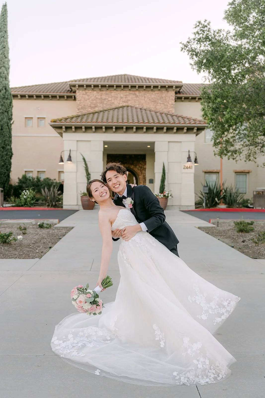 Tony dipping Victoria in front of the Vellano Estate entrance