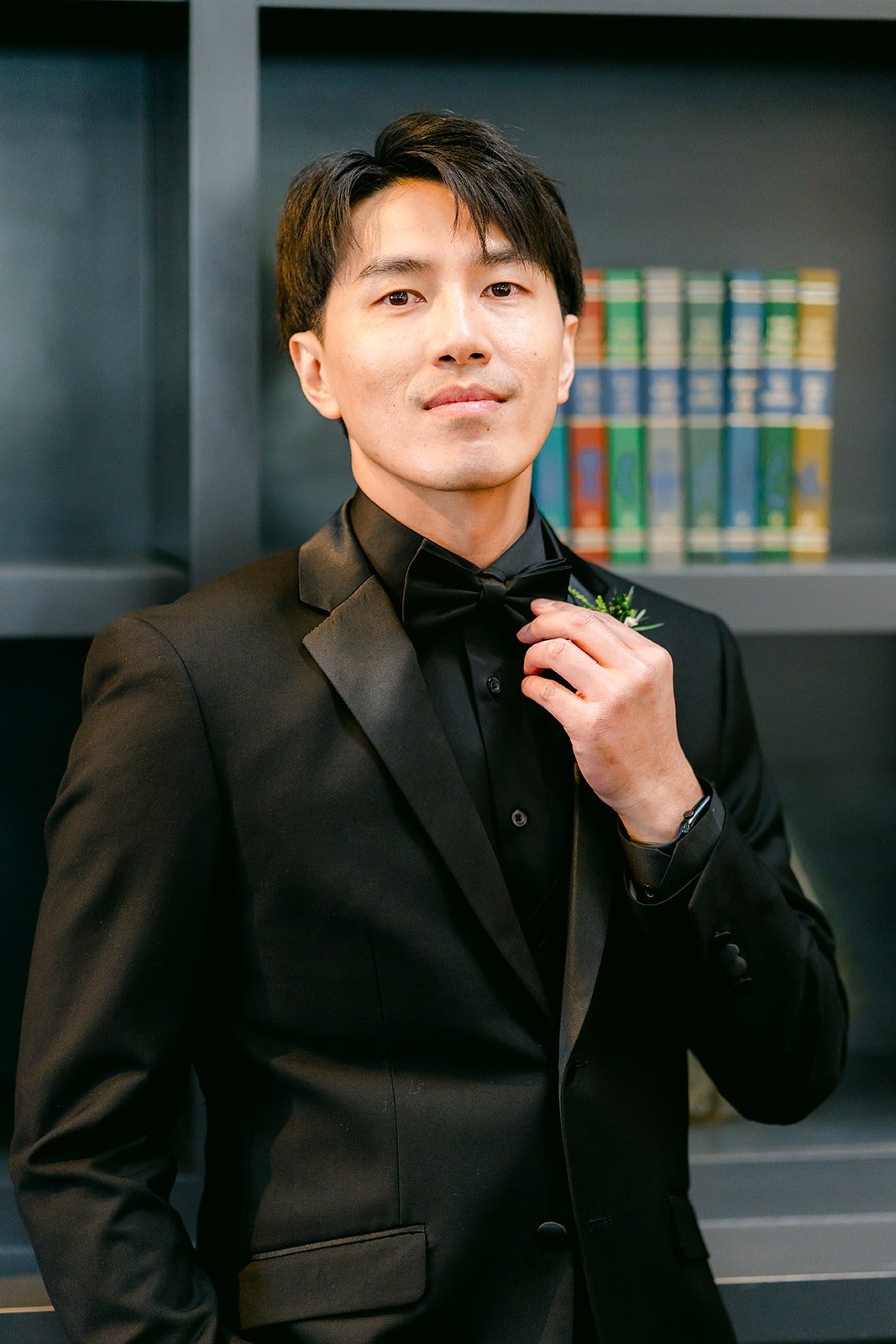 Fong adjusting his bow tie