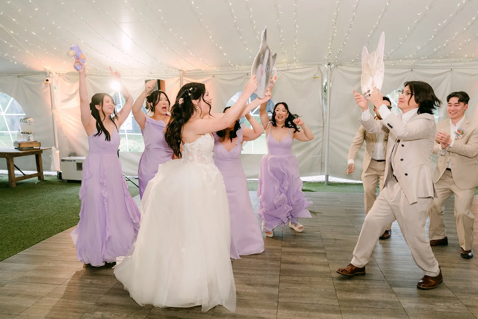 Wedding party dancing as Kat and Mike make their entrance