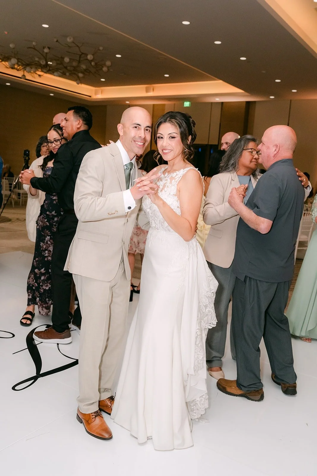 Couples fill the dance floor for the anniversary dance, photographed by One and Only Production