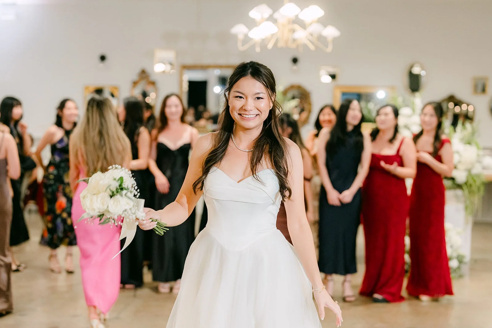 Jadee getting ready to toss her bouquet