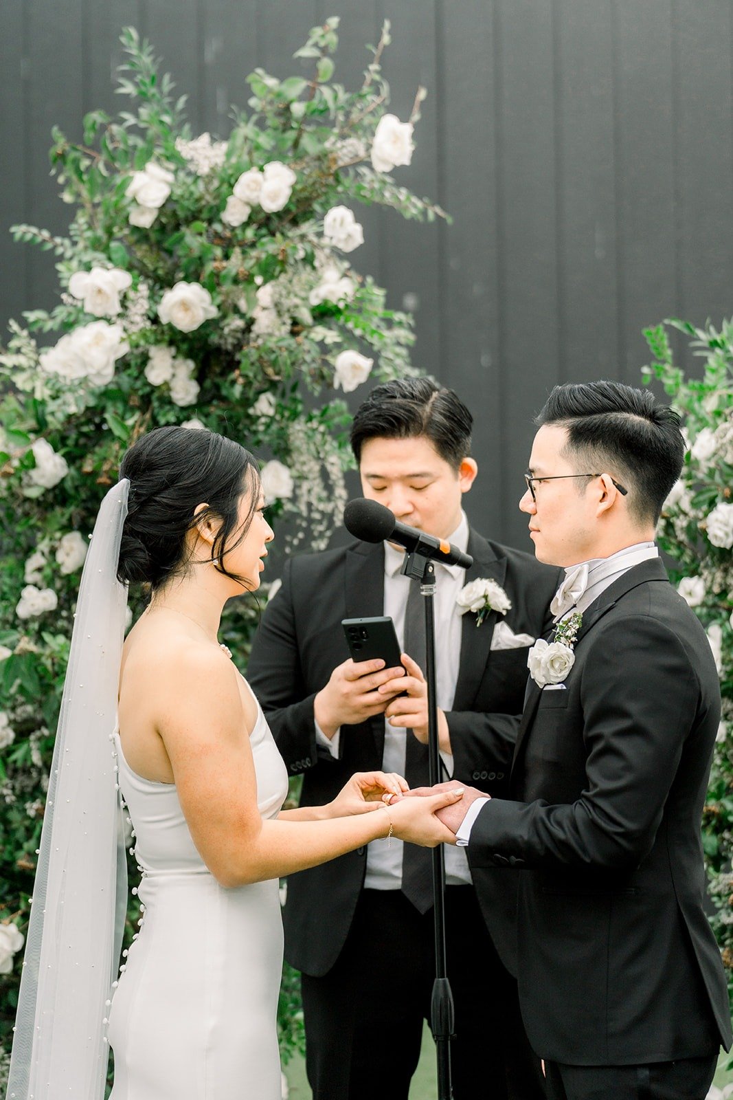 Alex places the ring on Cindy's finger
